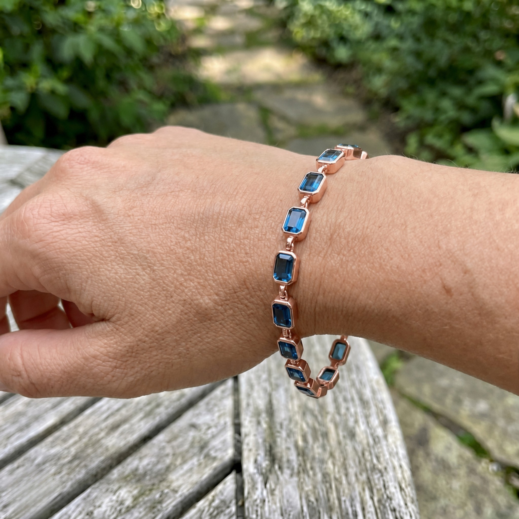 Classic gemstone tennis bracelet available in white, yellow, and rose gold.