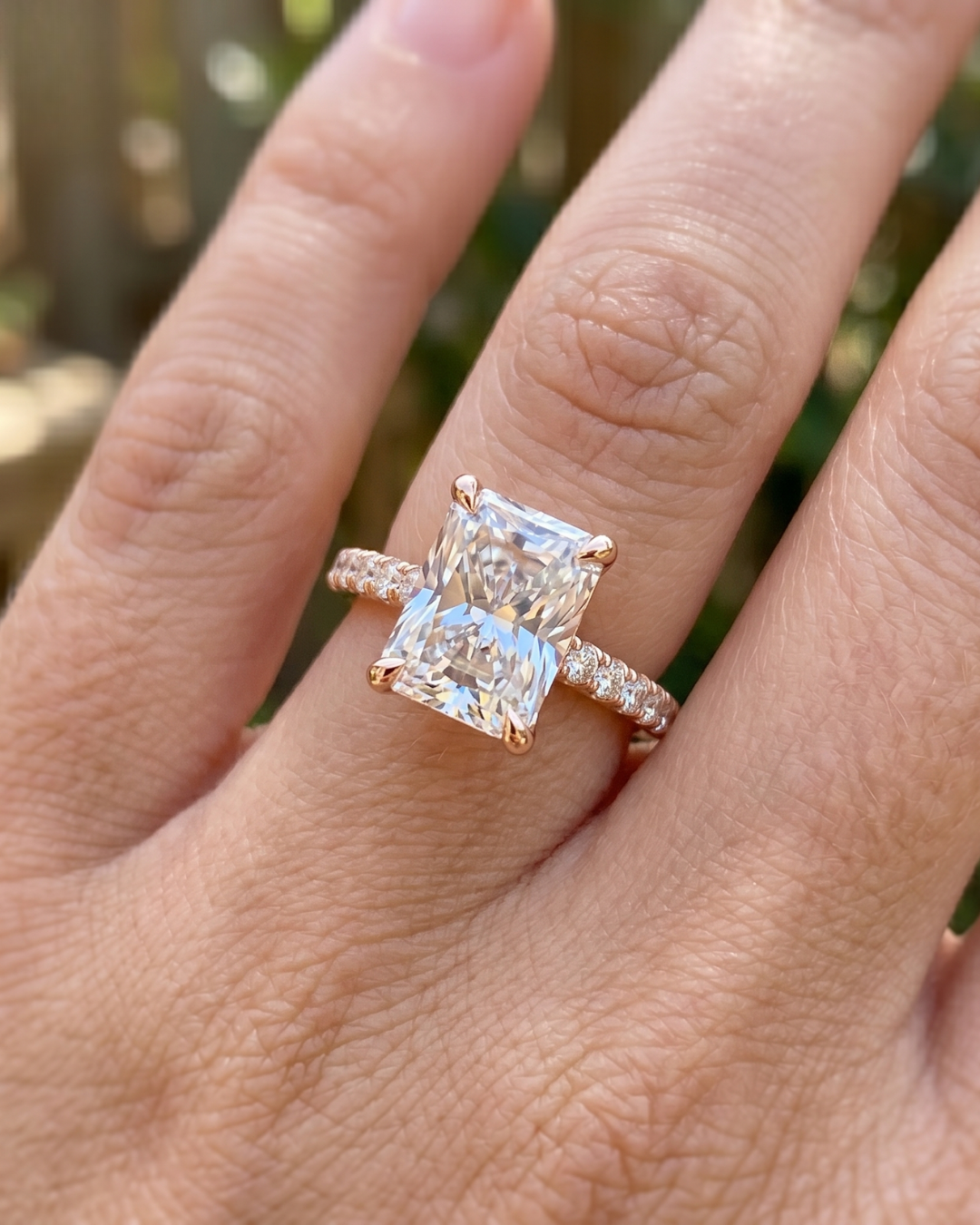 2.304 carat radiant lab-grown diamond ring by Kiashaa Jewellery in rose gold with sparkling round diamond accents.