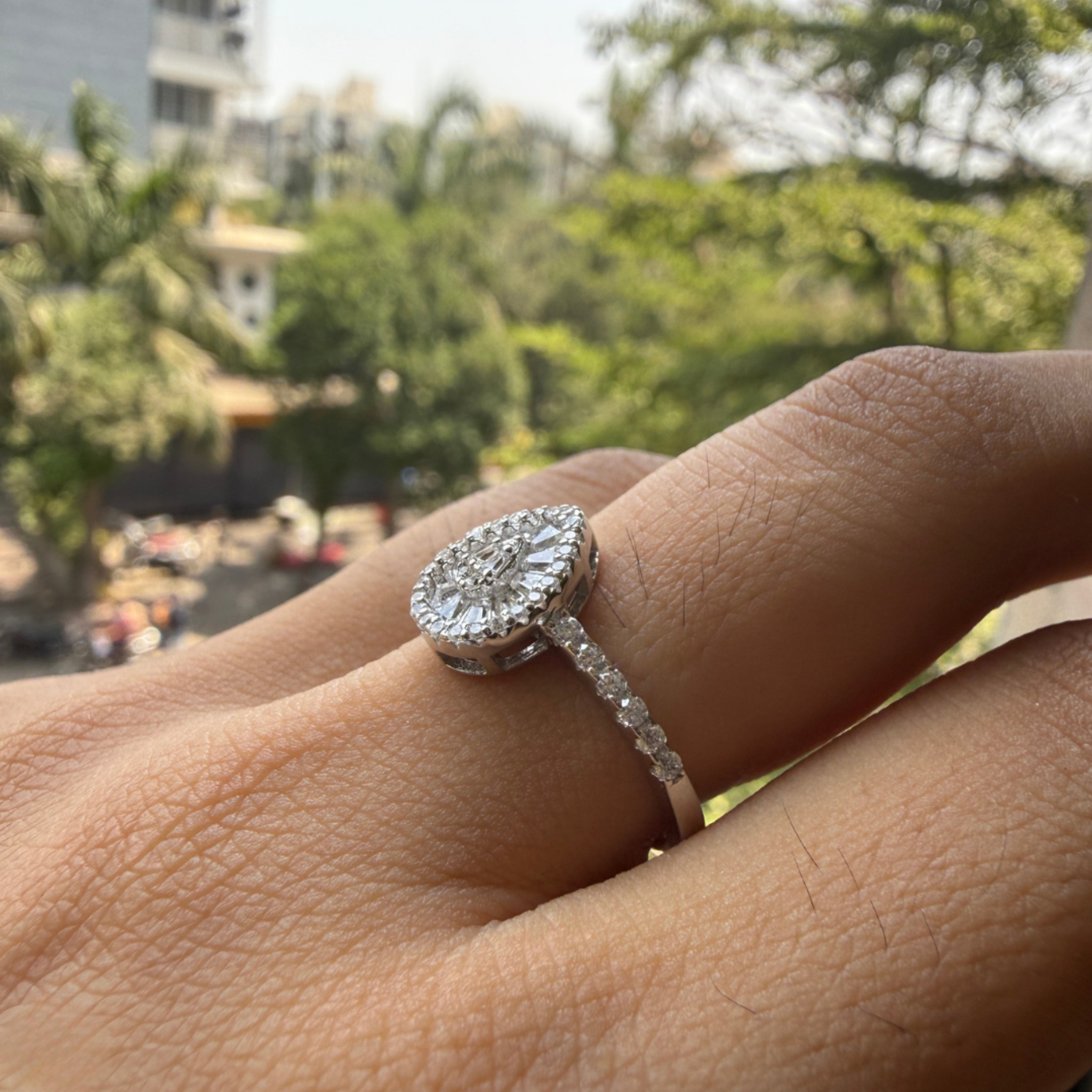 Luxury pear cluster engagement ring handcrafted in 9K, 14K and 18K gold.