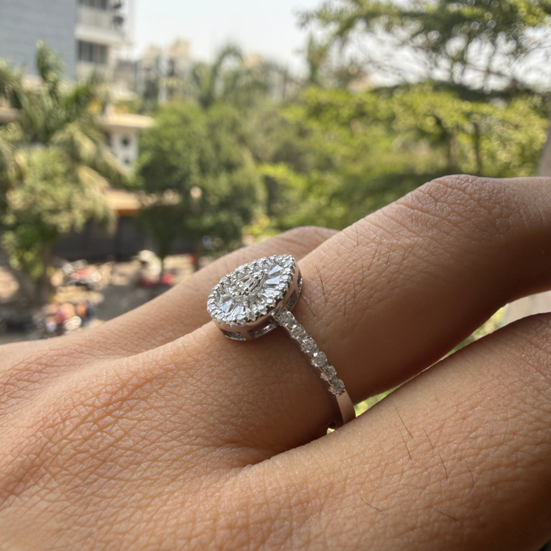 Luxury pear cluster engagement ring handcrafted in 9K, 14K and 18K gold.