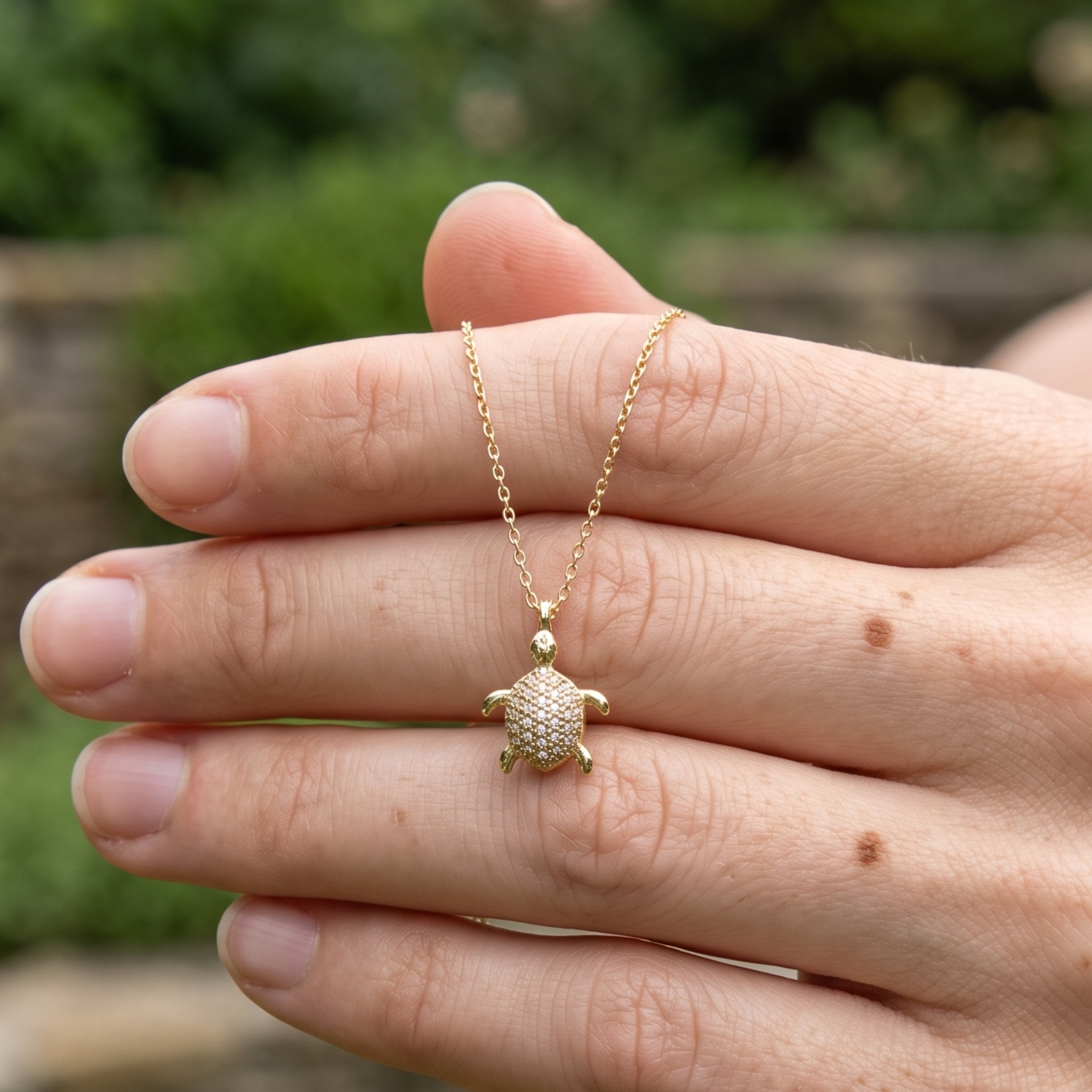 Kiashaa Jewellery 0.37 CTW diamond turtle pendant necklace in polished yellow gold.