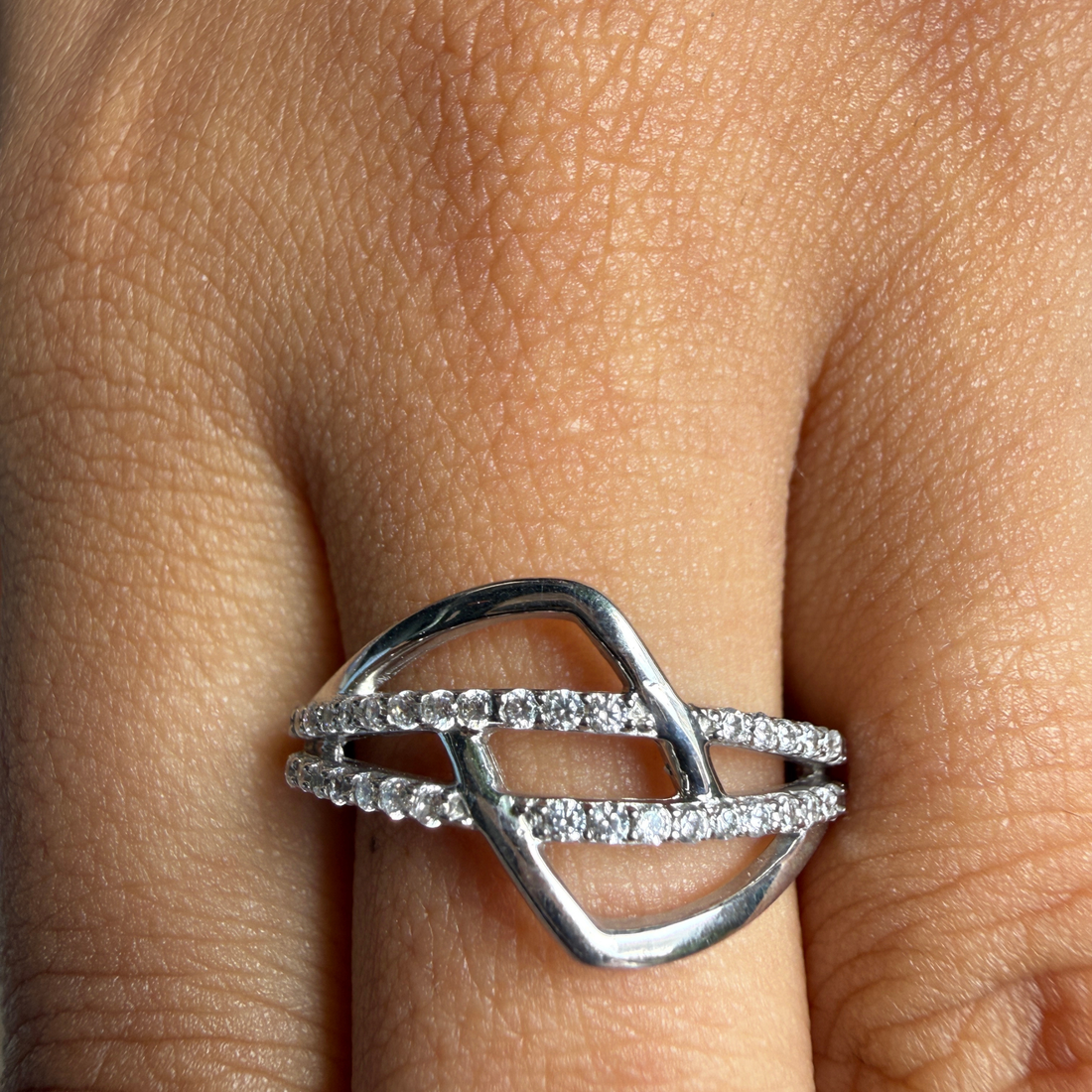 Contemporary open-frame diamond ring handcrafted in 9K, 14K and 18K gold.