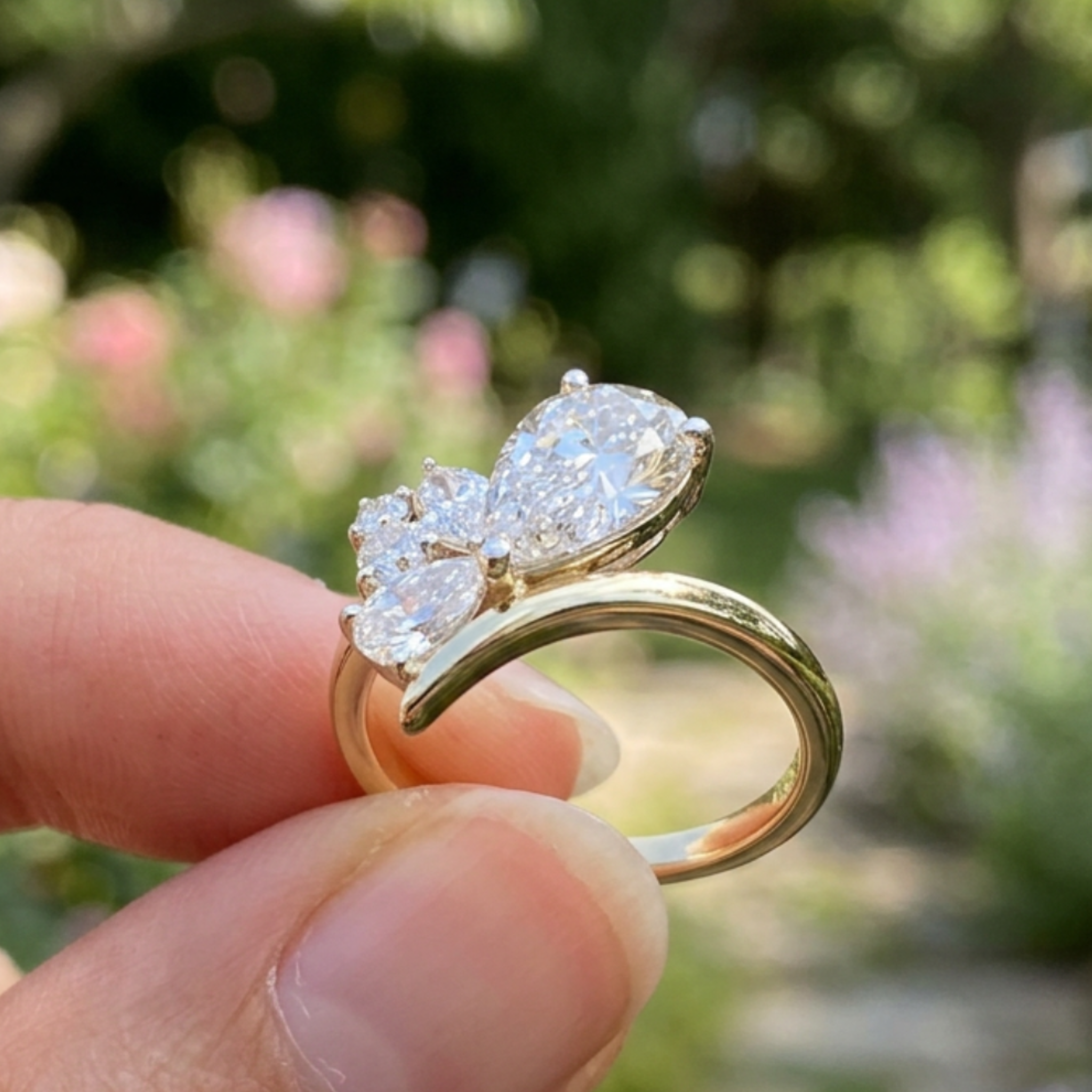 Flora Embrace 3 CTW lab-grown diamond ring by Kiashaa Jewellery with a 2 CT pear center and multi-shape side diamonds.