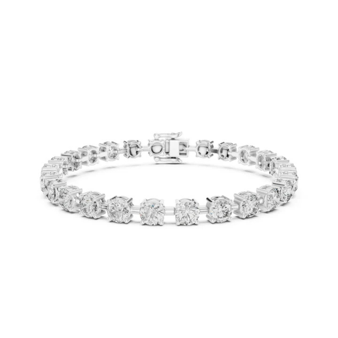 A diamond tennis bracelet in a silver-toned setting, arranged in a circular shape against a plain white background.