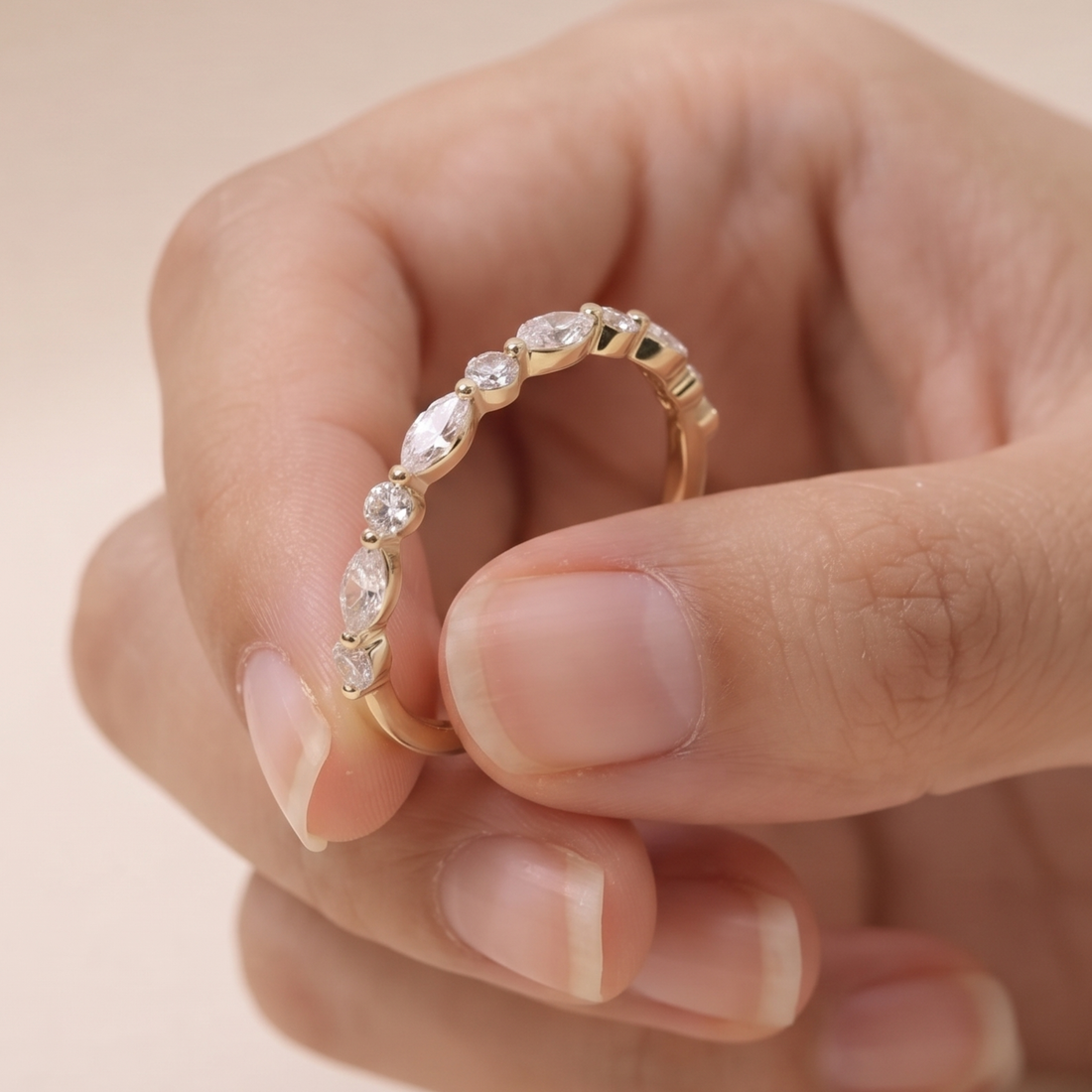 Marquise and round diamond wedding band by Kiashaa Jewellery in polished yellow gold.