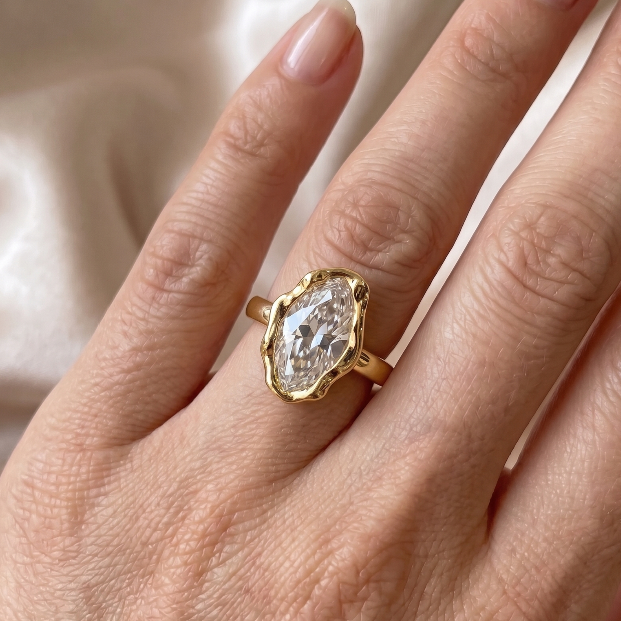 0.53 CT marquise diamond organic bezel engagement ring in yellow gold