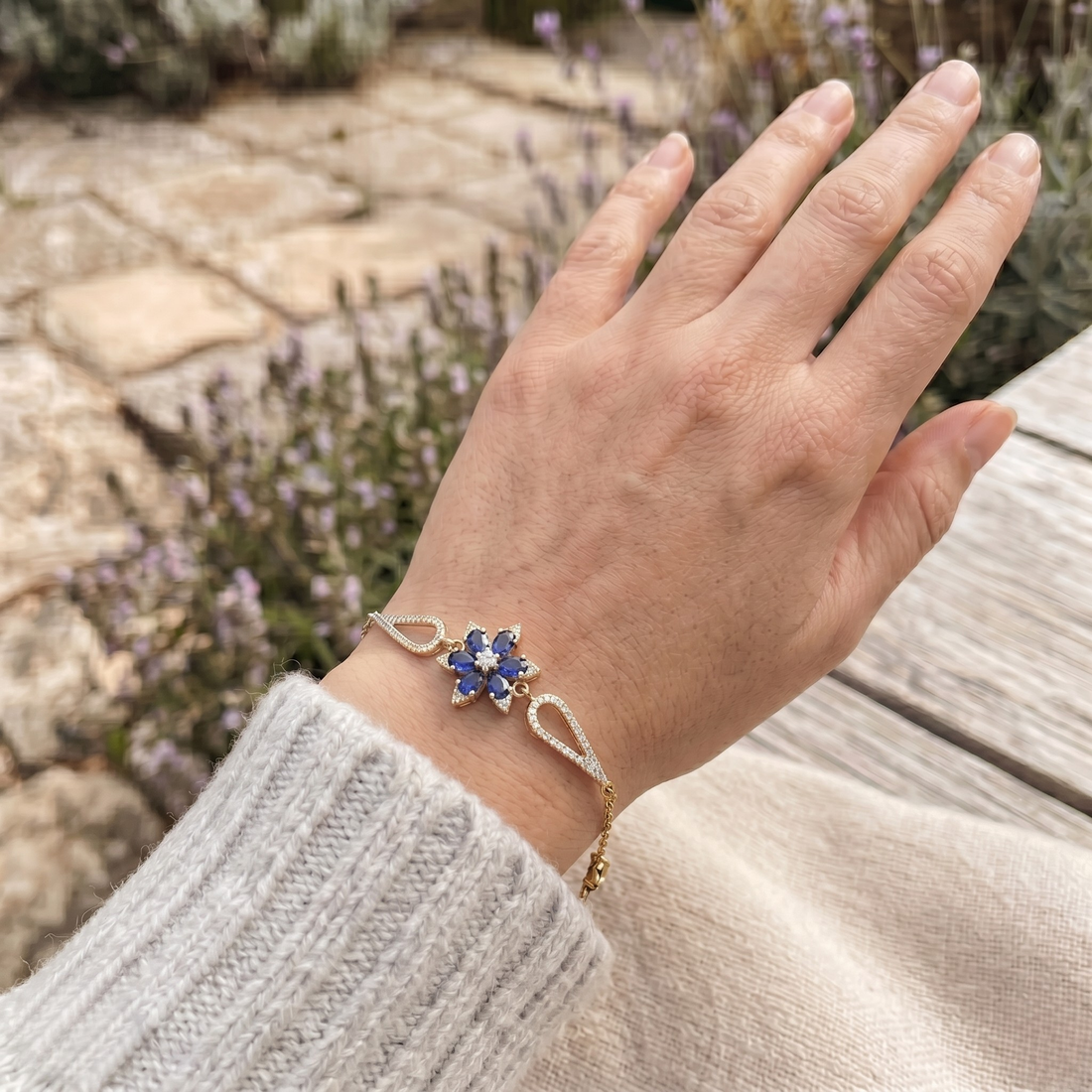 Blue pear gemstone and lab-grown diamond floral bracelet by Kiashaa Jewellery.
