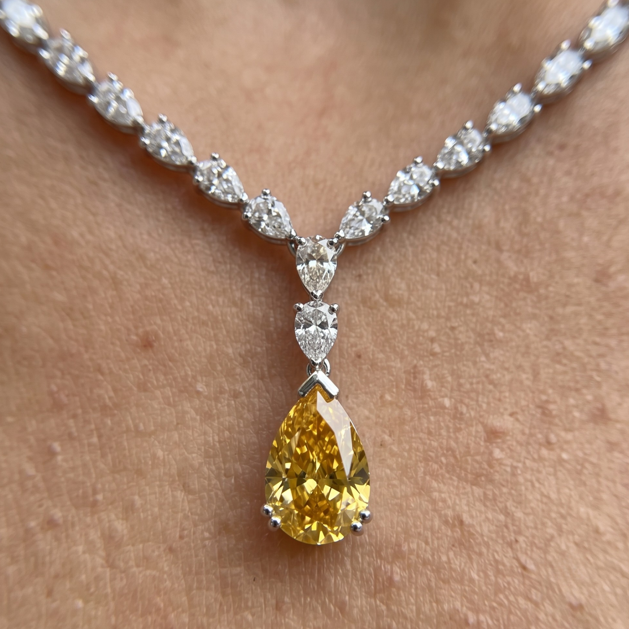 Luxury statement necklace featuring 74 listed pear-shaped stones in a graduated arrangement.