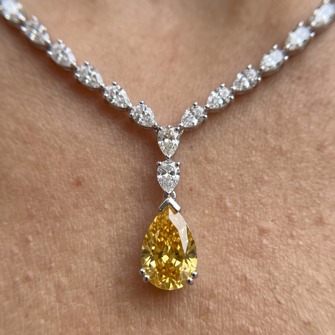 Luxury statement necklace featuring 74 listed pear-shaped stones in a graduated arrangement.