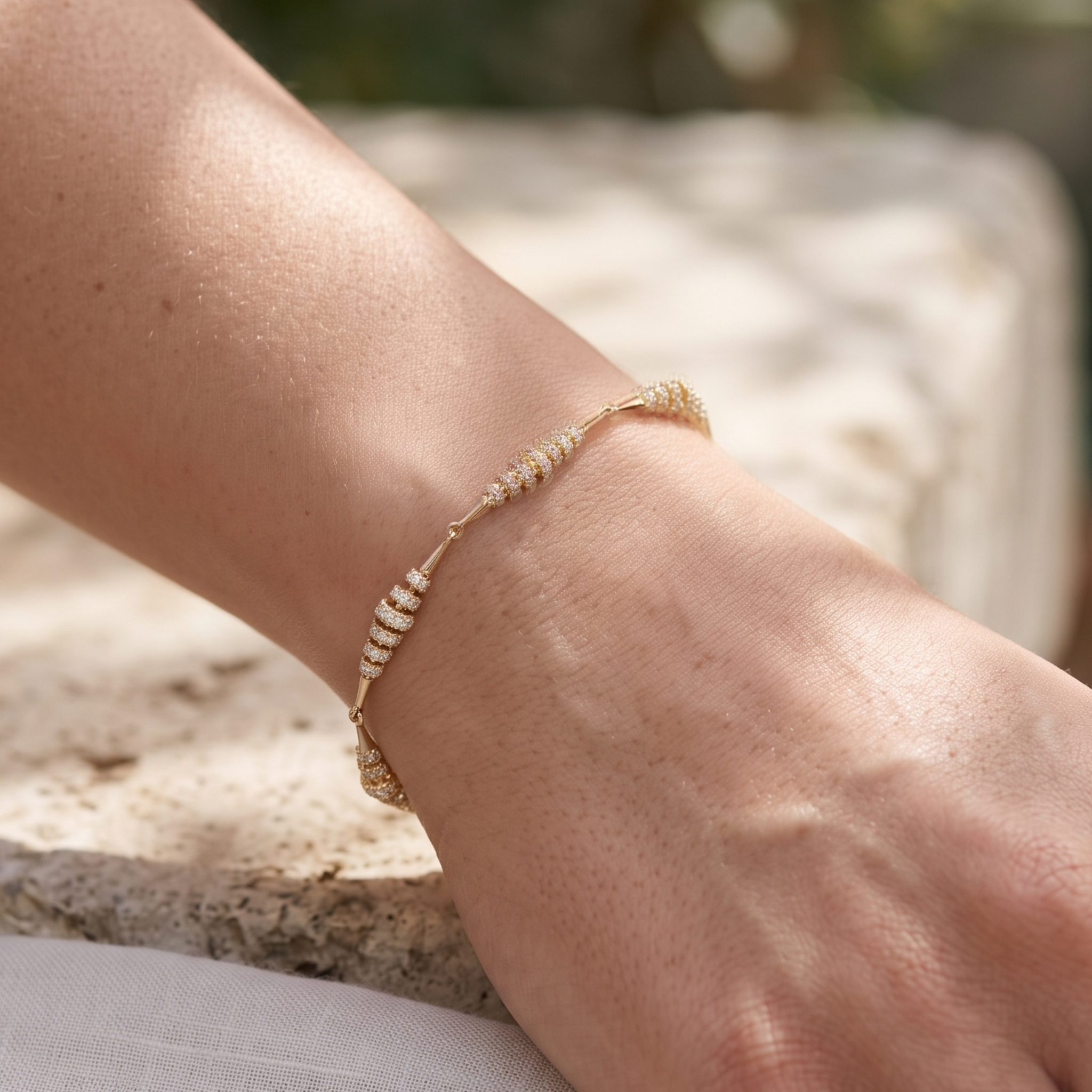 Kiashaa Jewellery 2.55 CTW round diamond station bracelet in polished yellow gold.