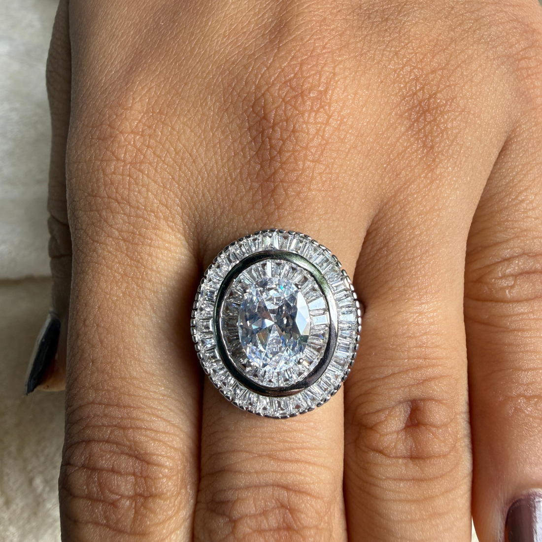 Oval and baguette lab-grown diamond double halo ring by Kiashaa Jewellery.