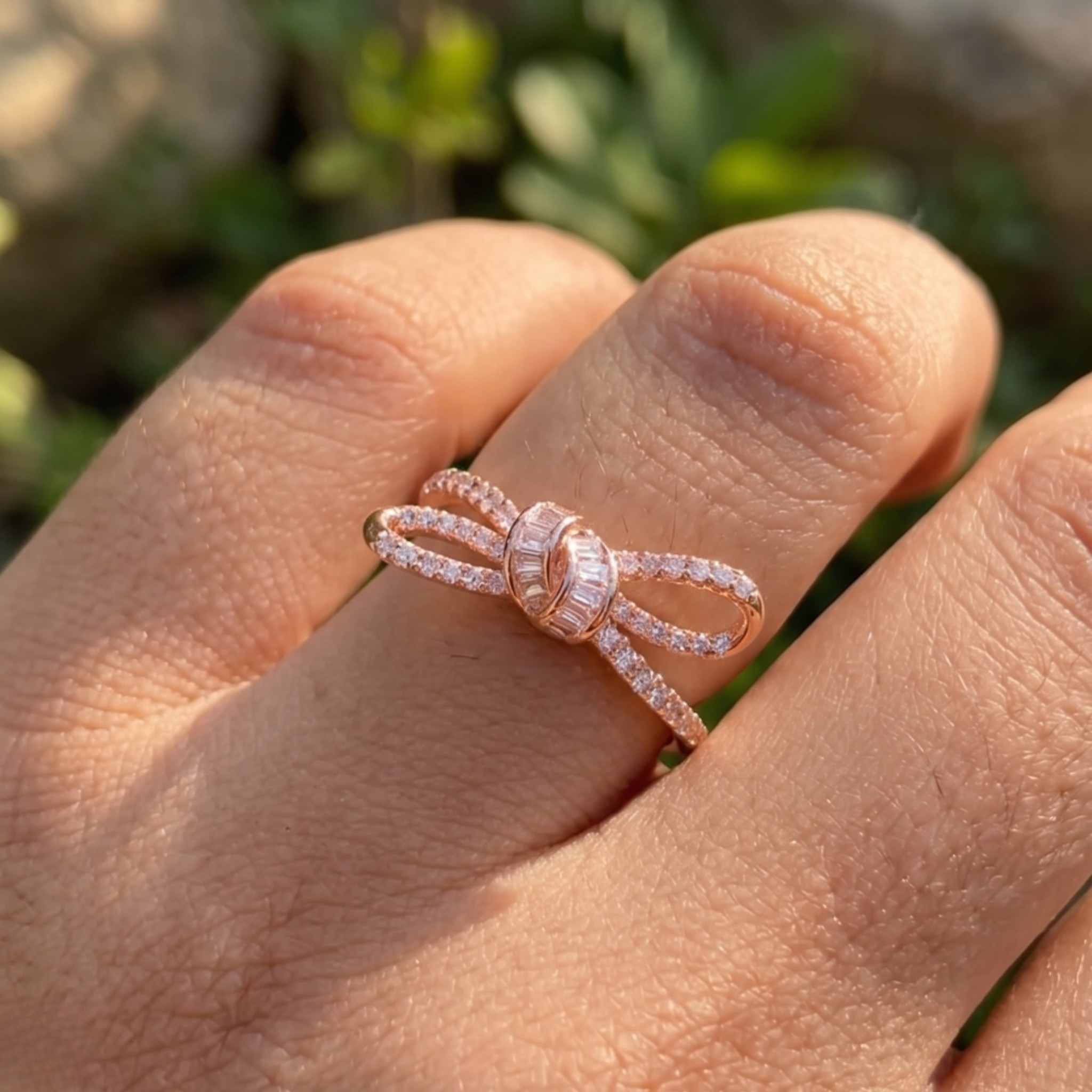 Luxury bow-inspired diamond ring handcrafted in 9K, 14K and 18K gold.