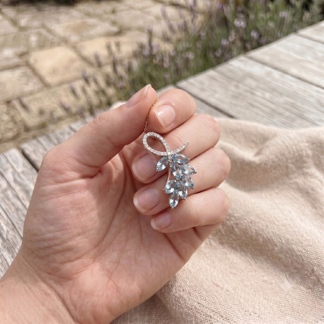 Sky blue marquise gemstone leaf pendant necklace with lab-grown diamonds by Kiashaa Jewellery.
