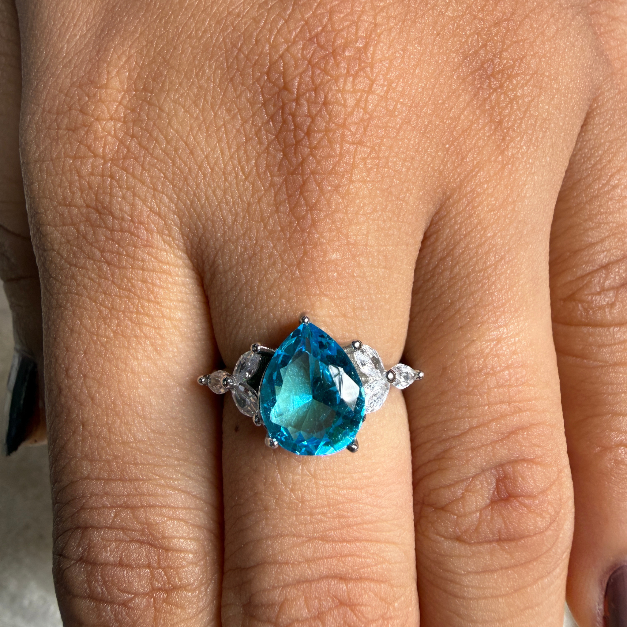 Blue pear gemstone and marquise lab-grown diamond ring by Kiashaa Jewellery.
