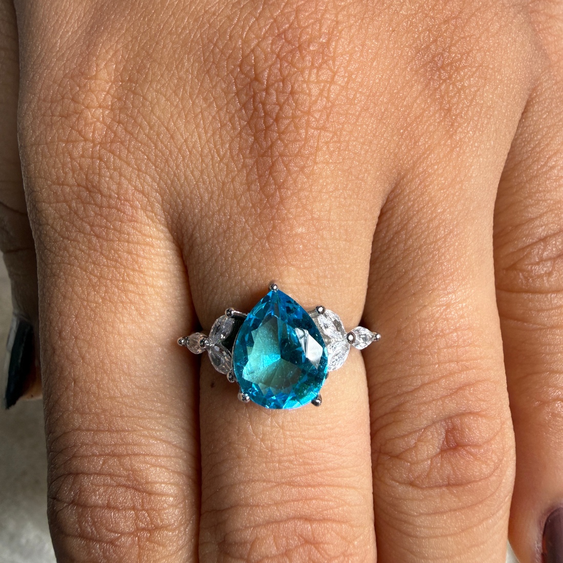 Blue pear gemstone and marquise lab-grown diamond ring by Kiashaa Jewellery.