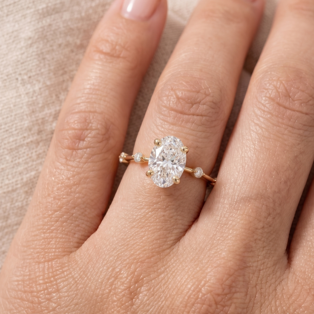 Large oval diamond proposal ring with floating diamond band