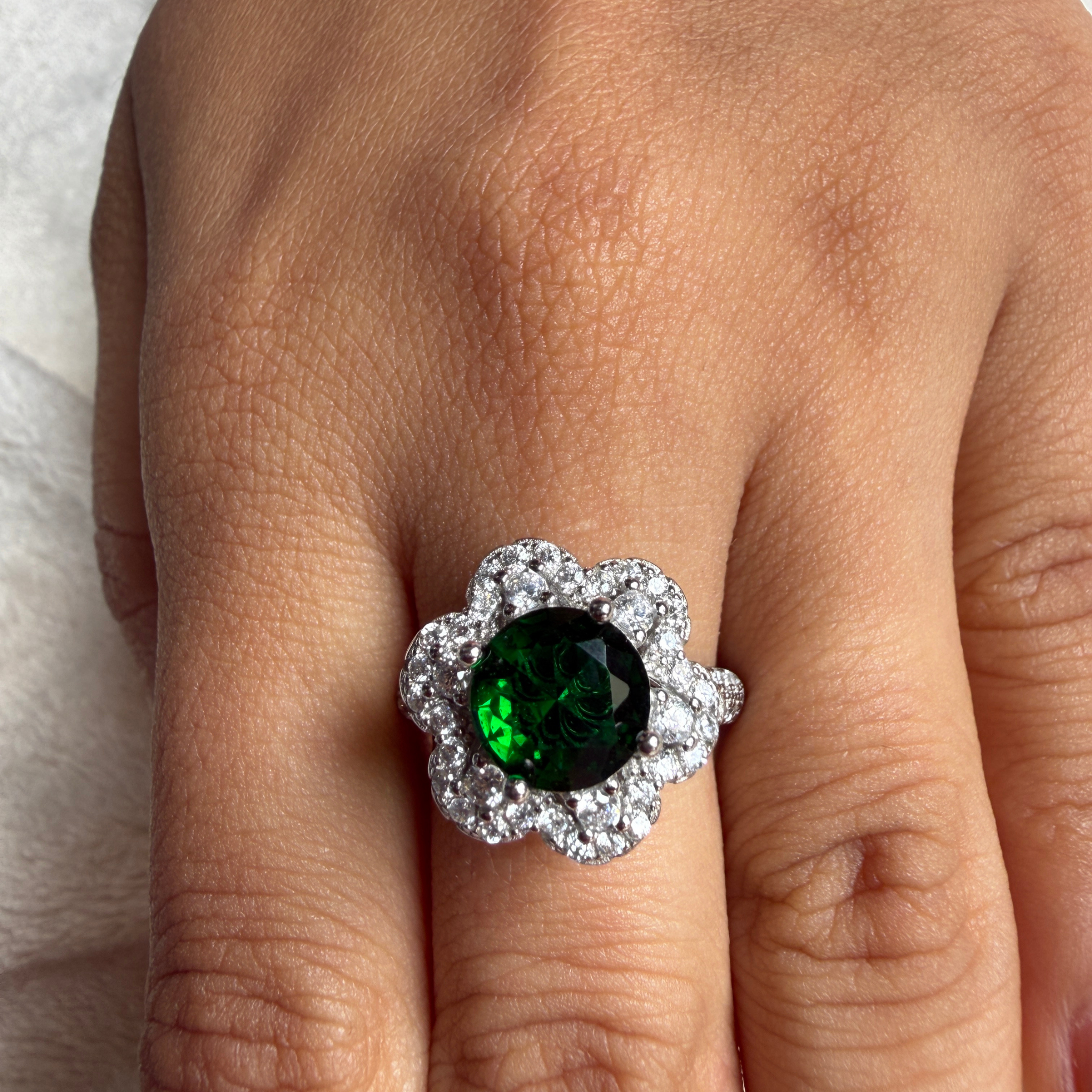 Green gemstone floral halo ring with lab-grown diamonds by Kiashaa Jewellery.