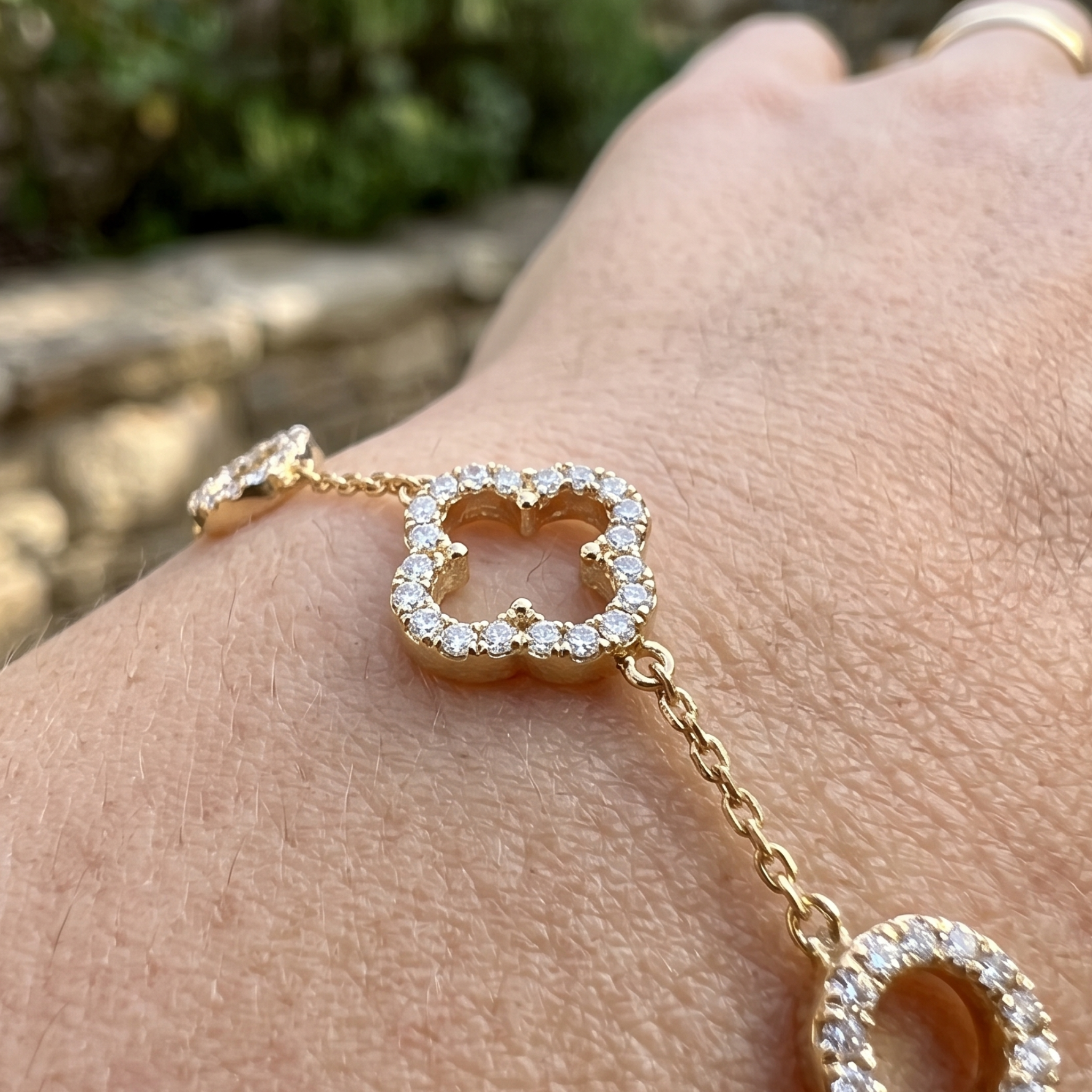 Kiashaa Jewellery 0.875 CTW diamond clover station bracelet in polished yellow gold.
