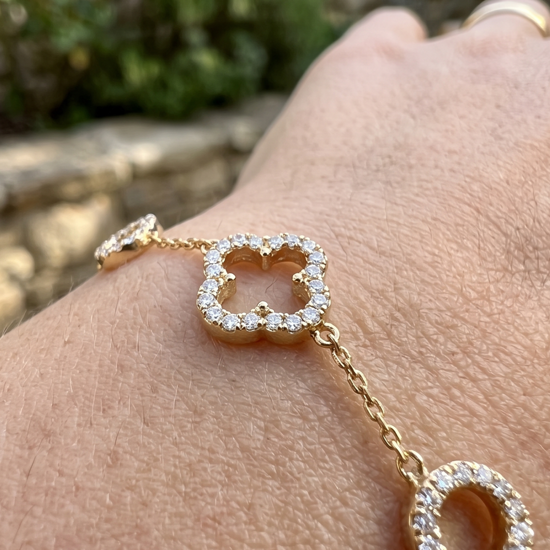 Kiashaa Jewellery 0.875 CTW diamond clover station bracelet in polished yellow gold.