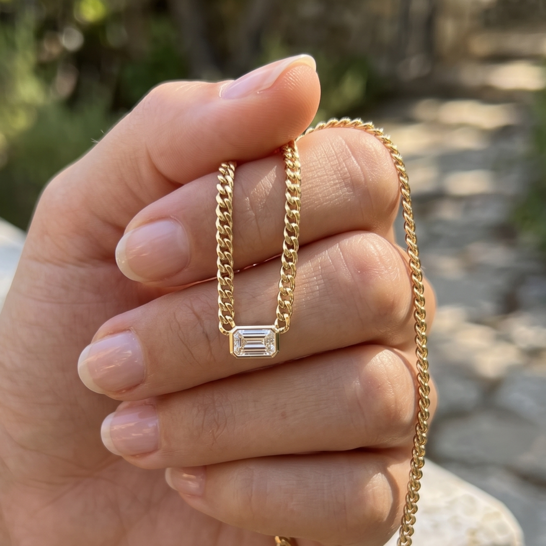 Kiashaa Jewellery 1.73 CT emerald-cut diamond Cuban chain necklace in polished yellow gold.