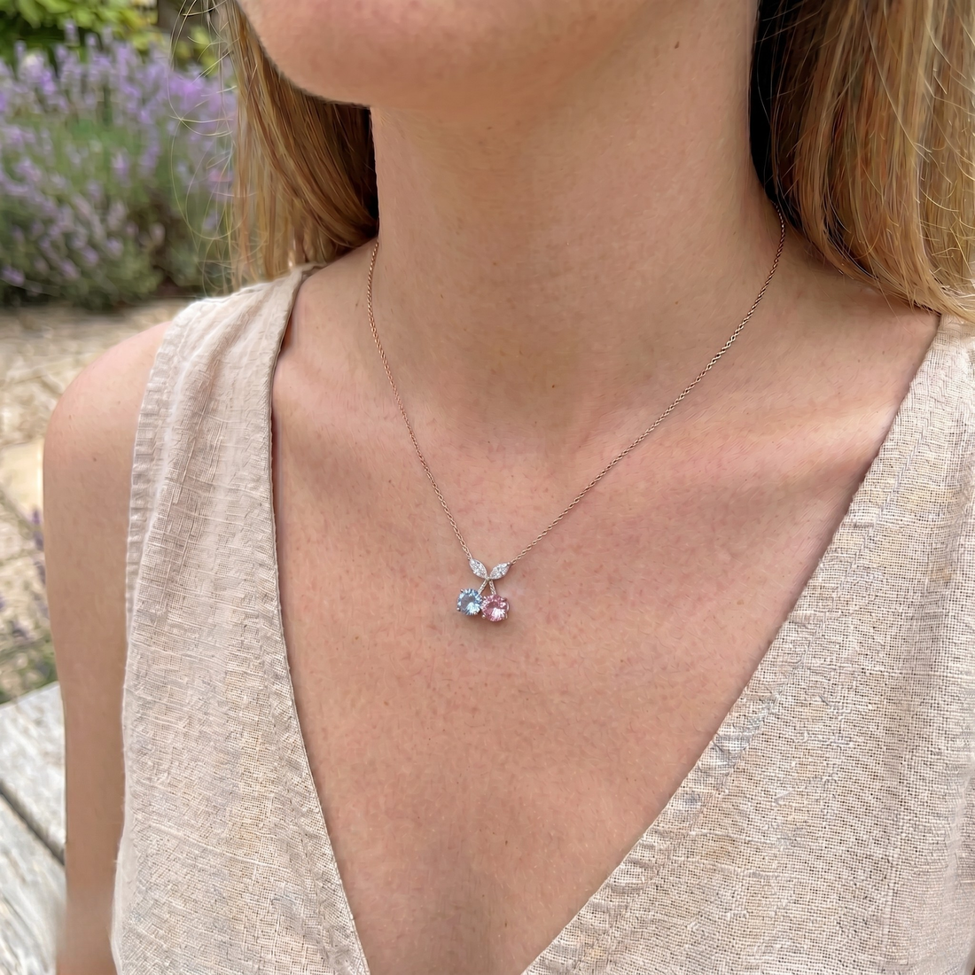 Blue and pink gemstone cherry pendant necklace with marquise lab-grown diamonds by Kiashaa Jewellery.