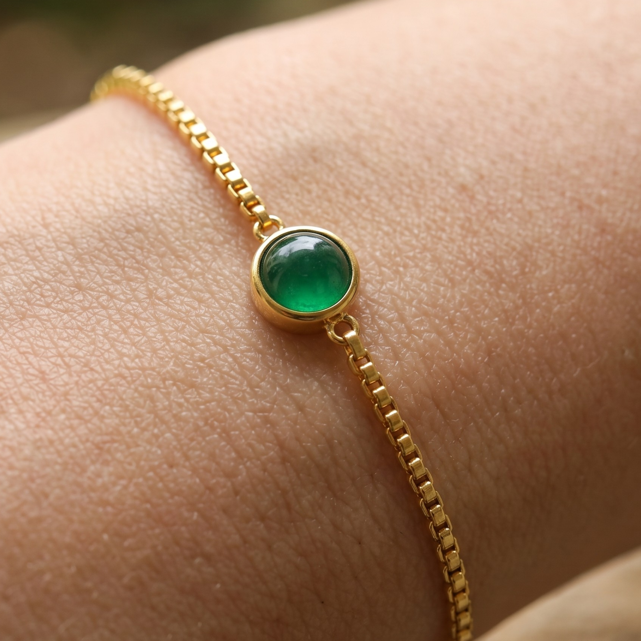 Kiashaa Jewellery 0.50 CT green oval gemstone bracelet in polished yellow gold.