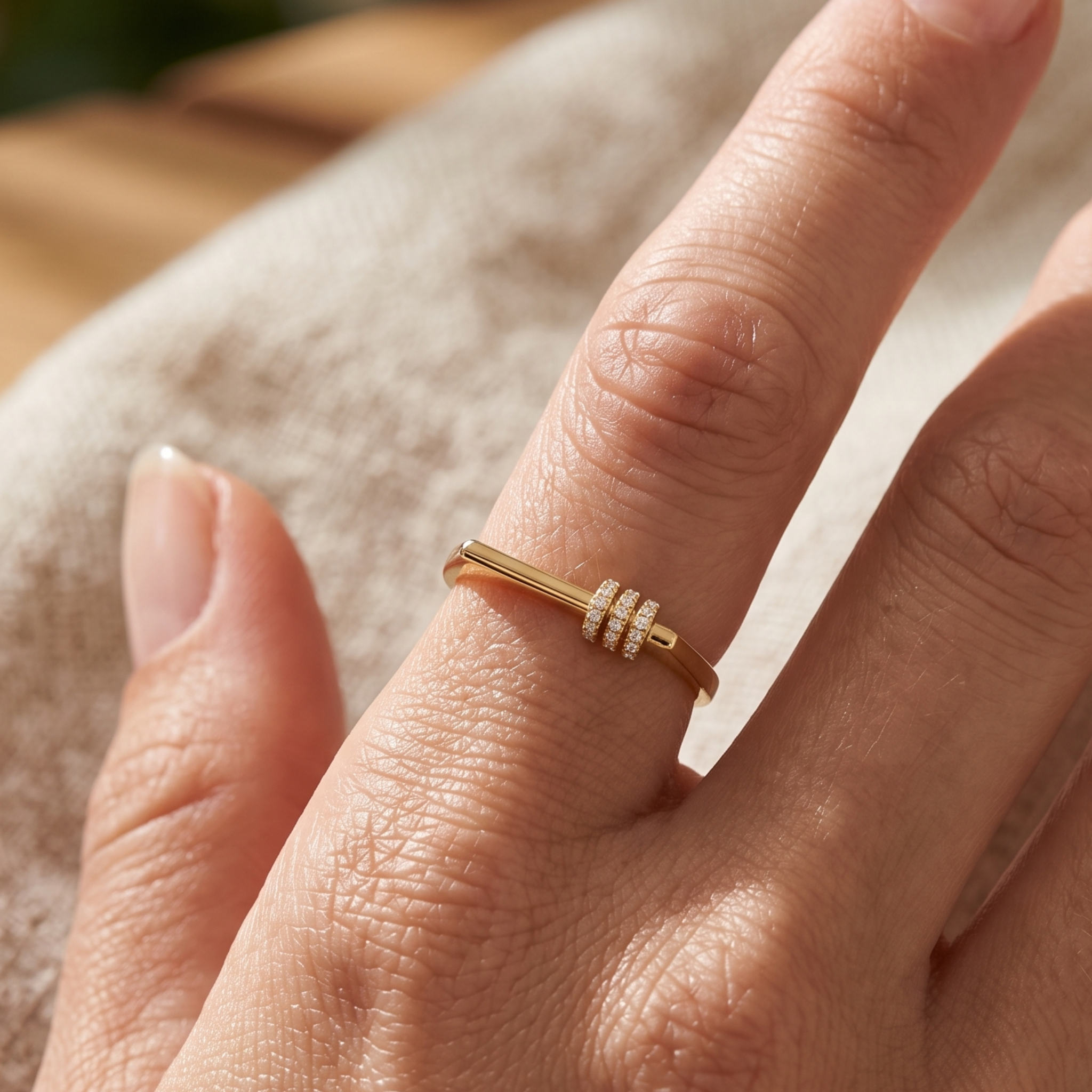 Kiashaa Jewellery 0.21 CTW triple-row diamond ring in polished yellow gold.