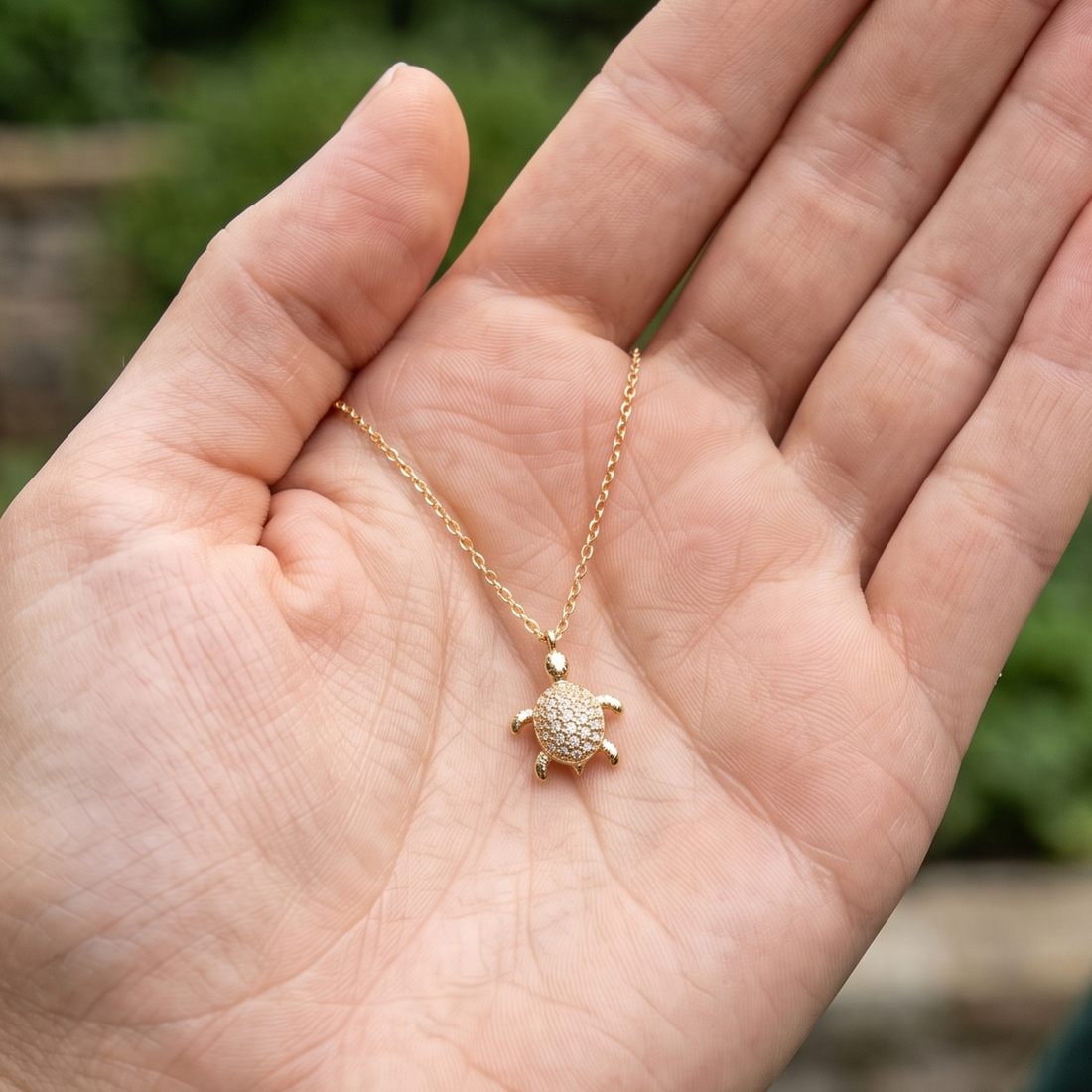 Kiashaa Jewellery 0.37 CTW diamond turtle pendant necklace in polished yellow gold.