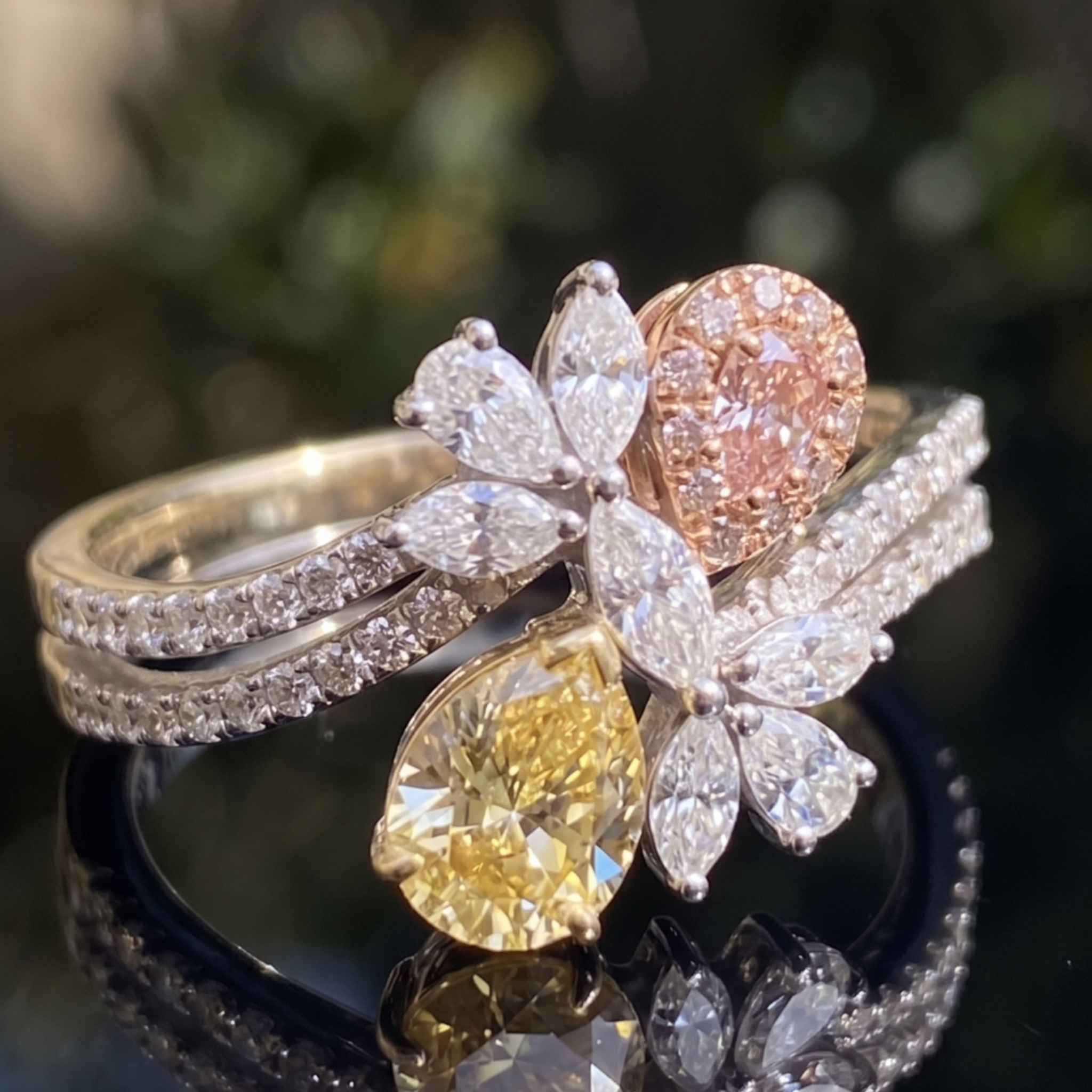 Aurora Bloom 3 CTW multi-color diamond floral ring by Kiashaa Jewellery with yellow and pink pear-shaped diamonds.