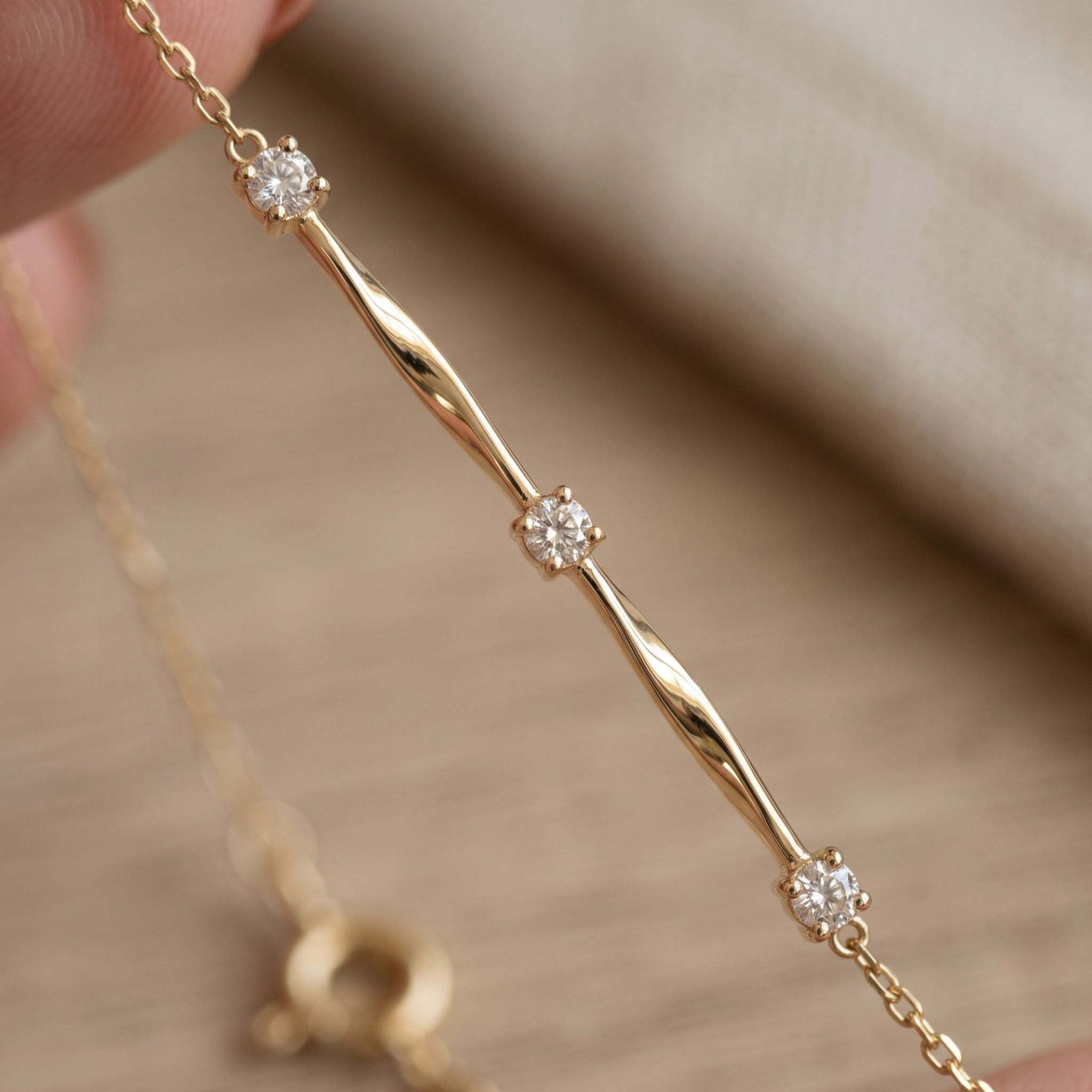Kiashaa Jewellery 0.075 CTW round diamond bar bracelet in polished yellow gold.