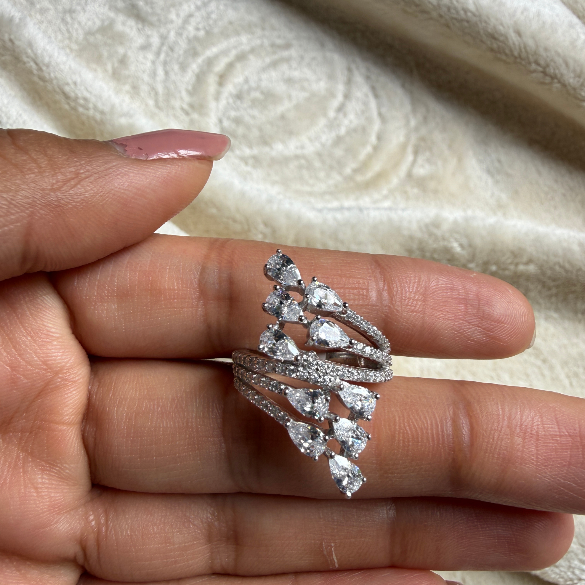 Pear leaf lab-grown diamond wrap ring in white gold by Kiashaa Jewellery.