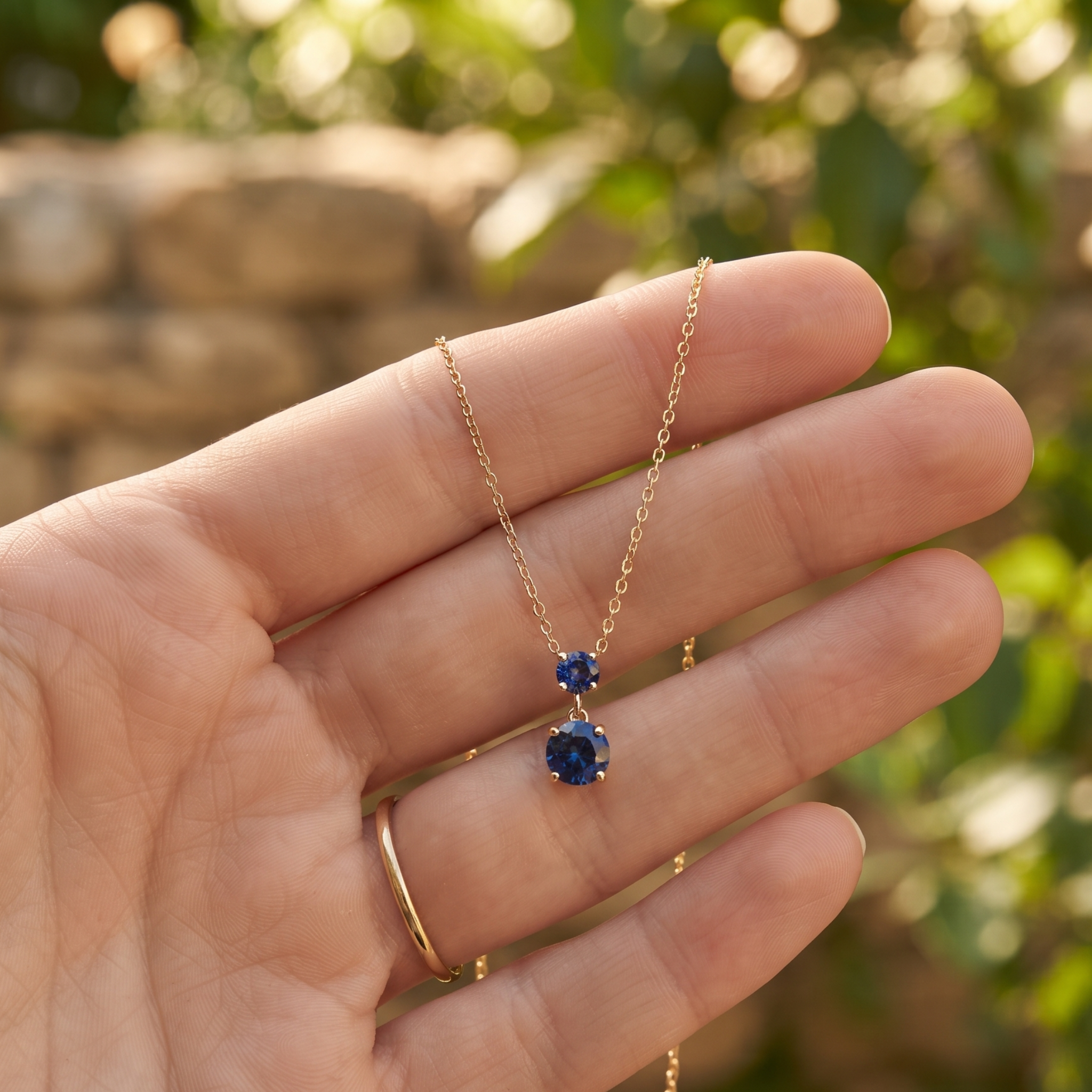Kiashaa Jewellery 0.68 CTW blue round drop necklace in polished yellow gold.