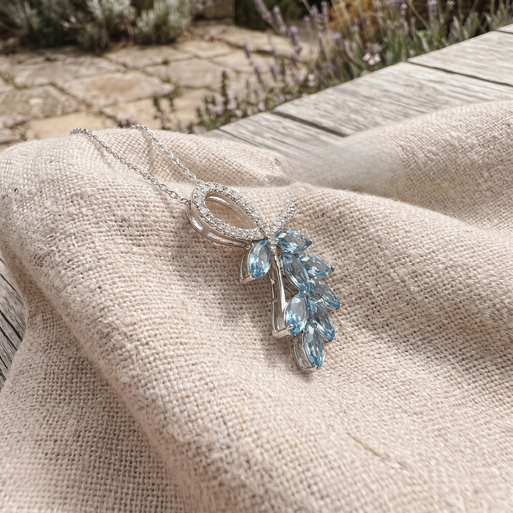 Sky blue marquise gemstone leaf pendant necklace with lab-grown diamonds by Kiashaa Jewellery.