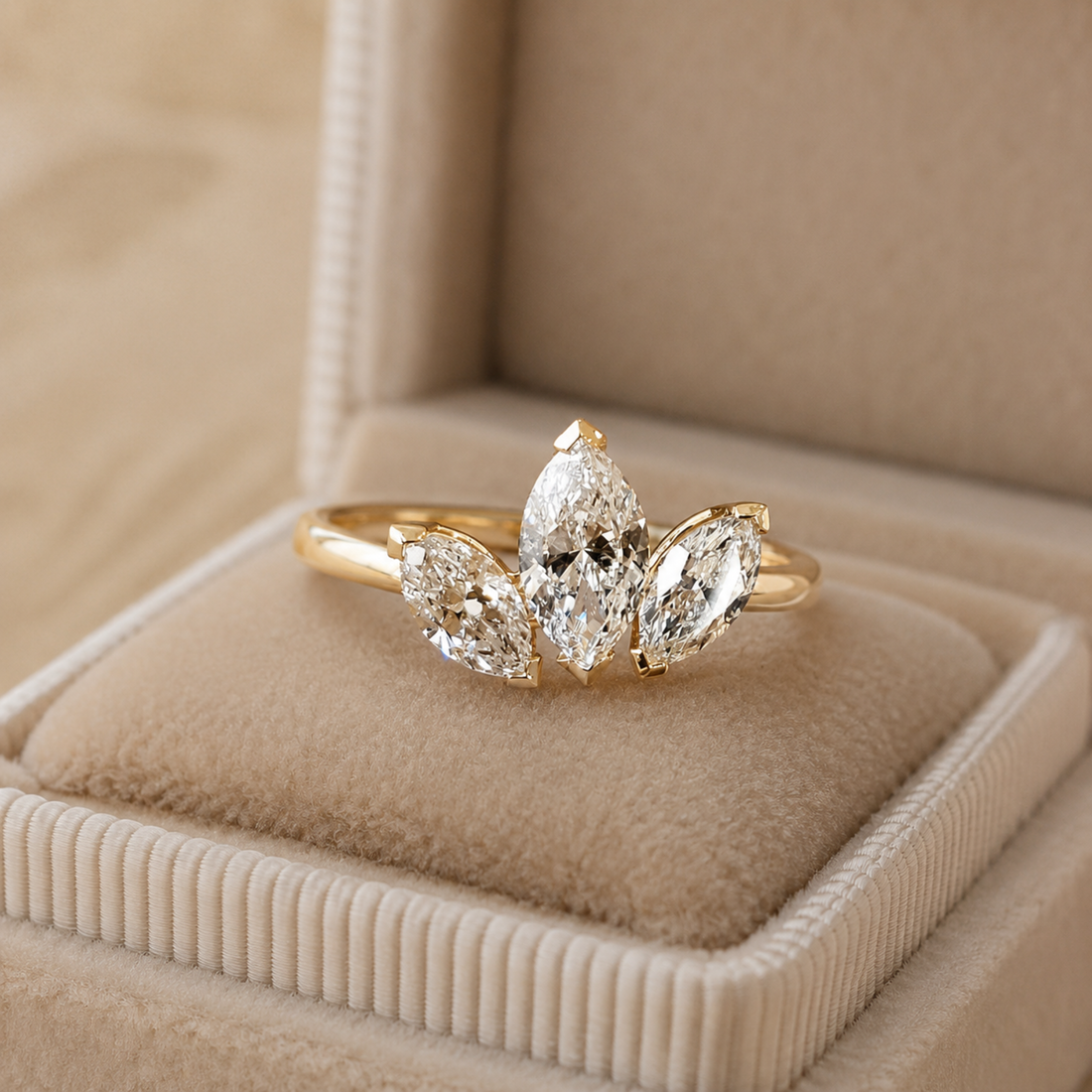 Luxury 1.72 CTW ring featuring three graduated marquise-cut diamonds.