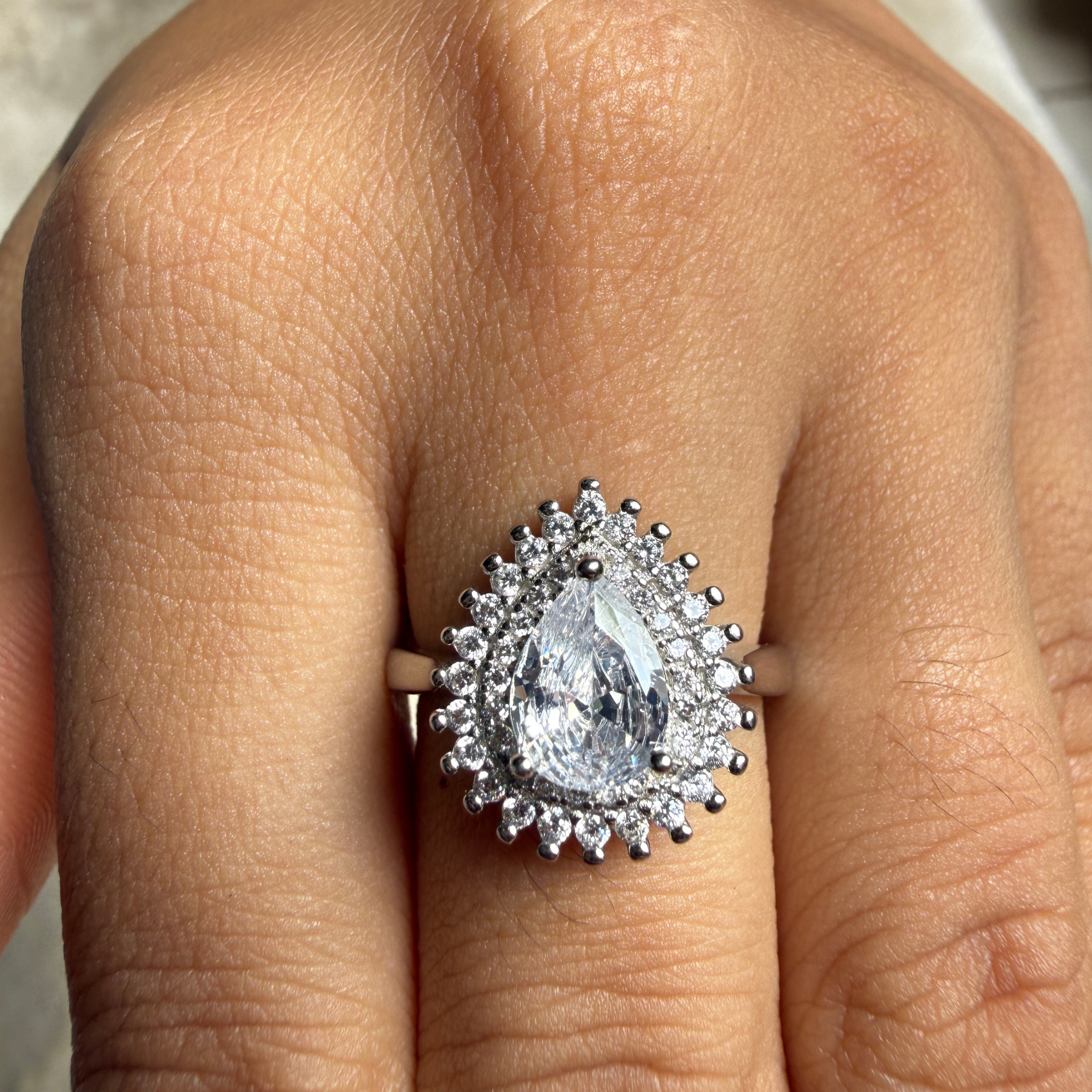 Pear halo lab-grown diamond engagement ring in white gold by Kiashaa Jewellery.