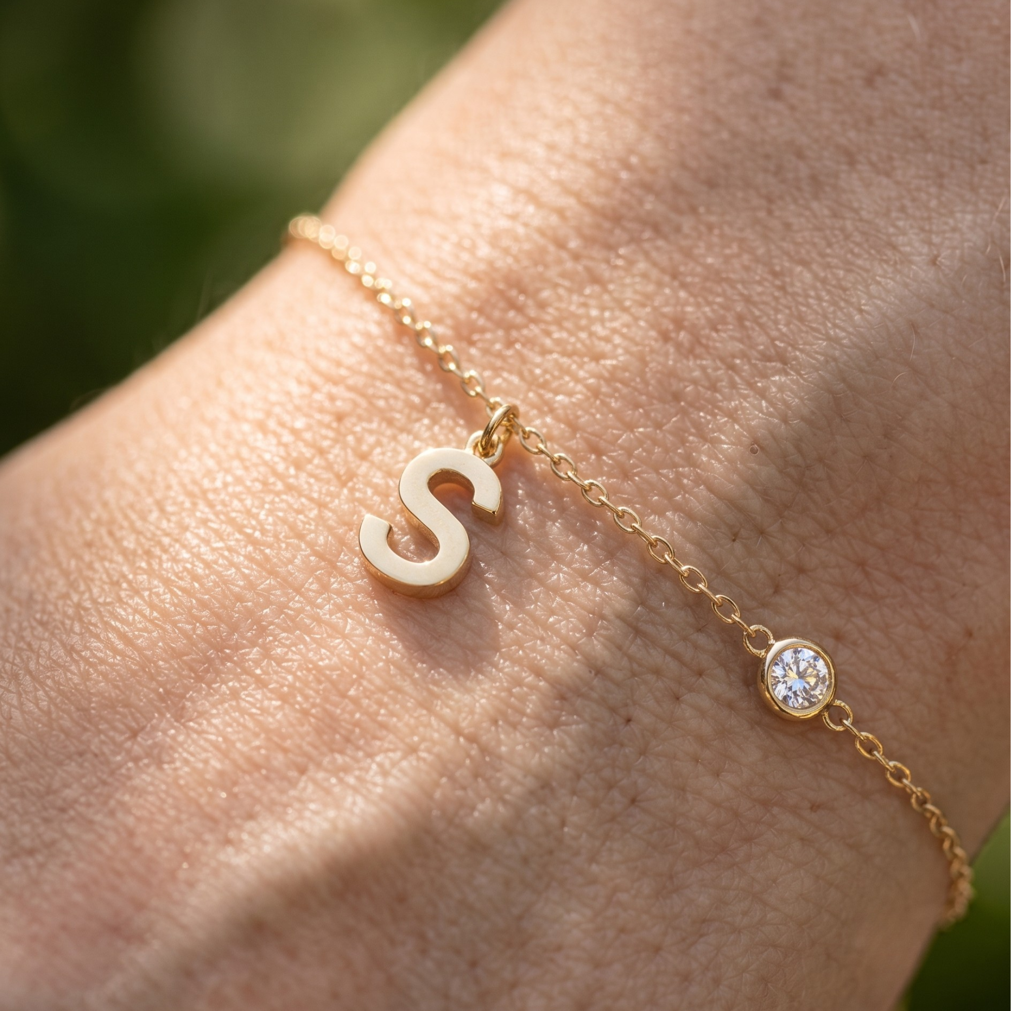 Kiashaa Jewellery personalized initial bracelet with 2.5 mm round diamond in yellow gold.