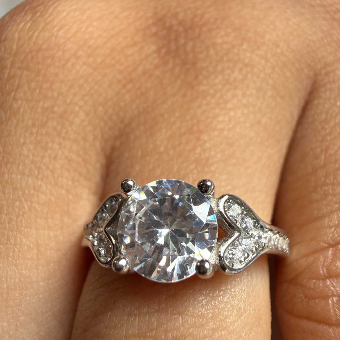 Round lab-grown diamond heart solitaire ring in white gold by Kiashaa Jewellery.