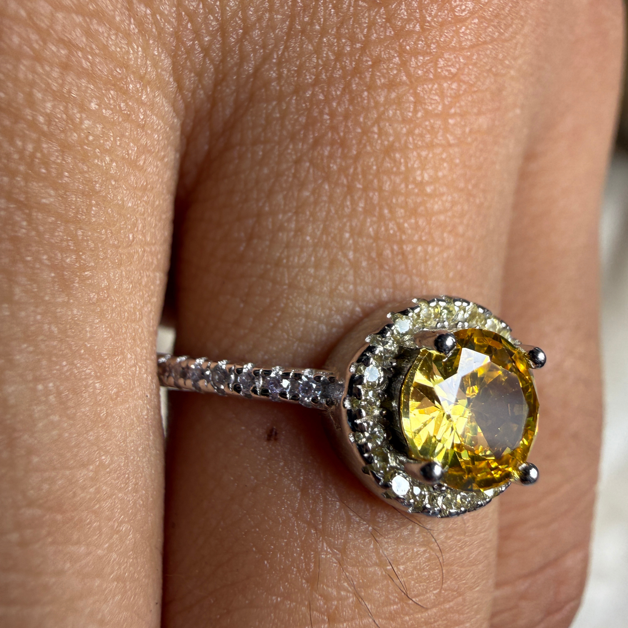 Yellow round gemstone halo ring with lab-grown diamonds by Kiashaa Jewellery.