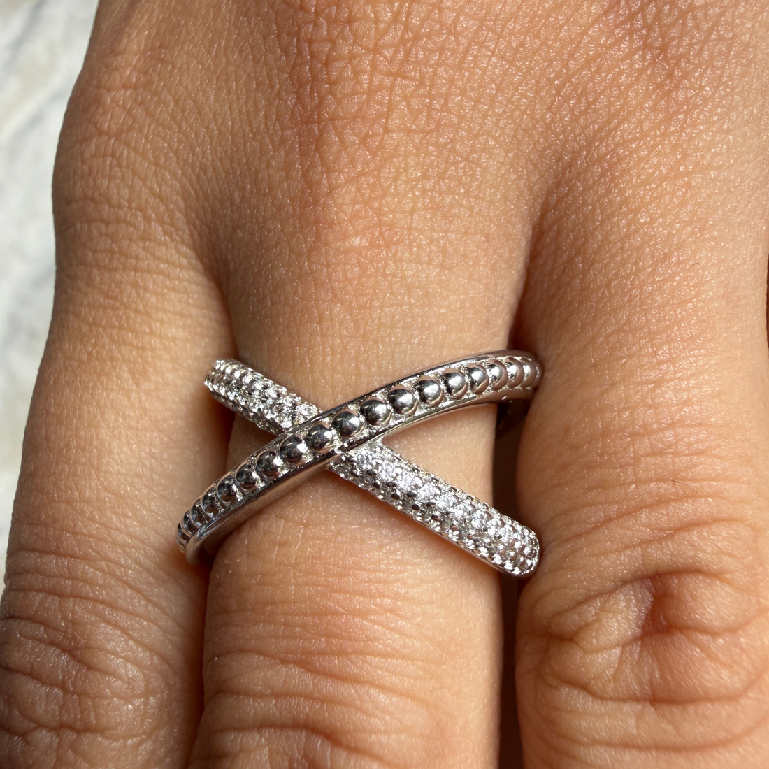 Criss-cross lab-grown diamond X ring in white gold by Kiashaa Jewellery.