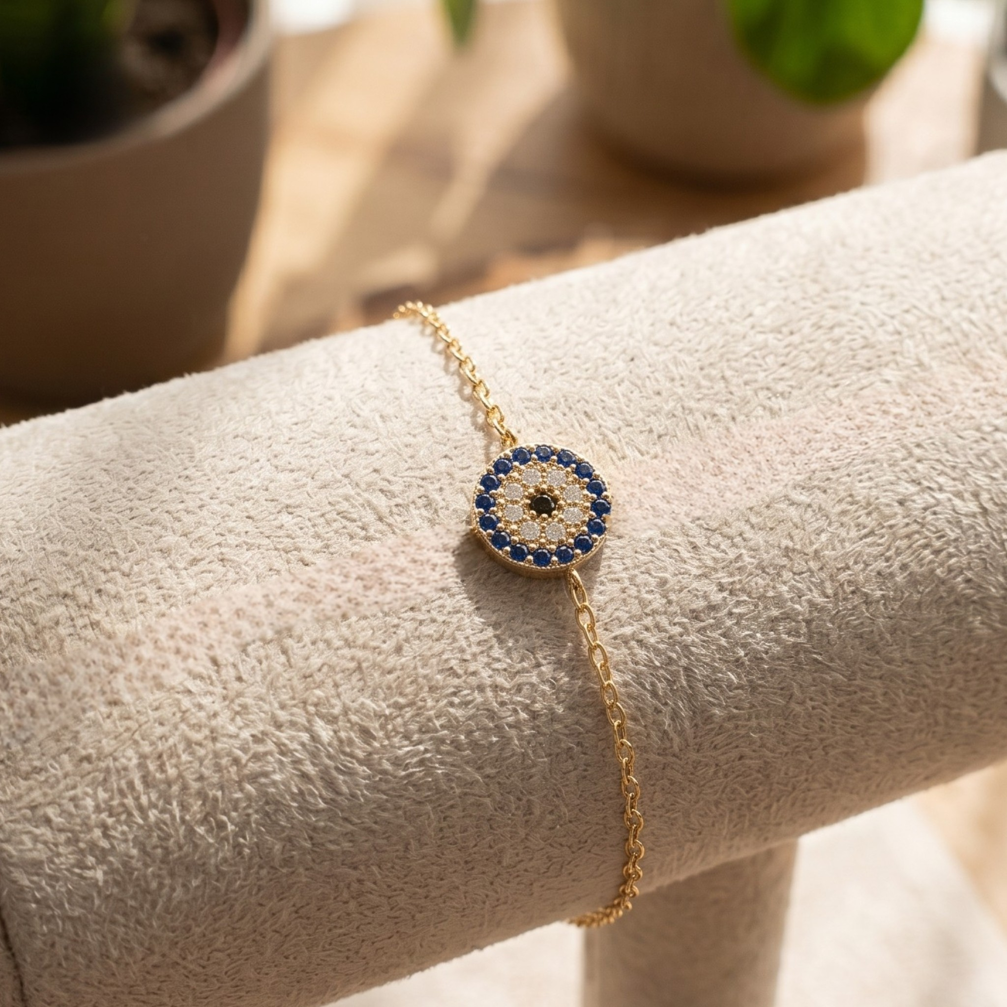 1.00 CT blue gemstone and diamond evil eye bracelet in yellow gold by Kiashaa Jewellery.