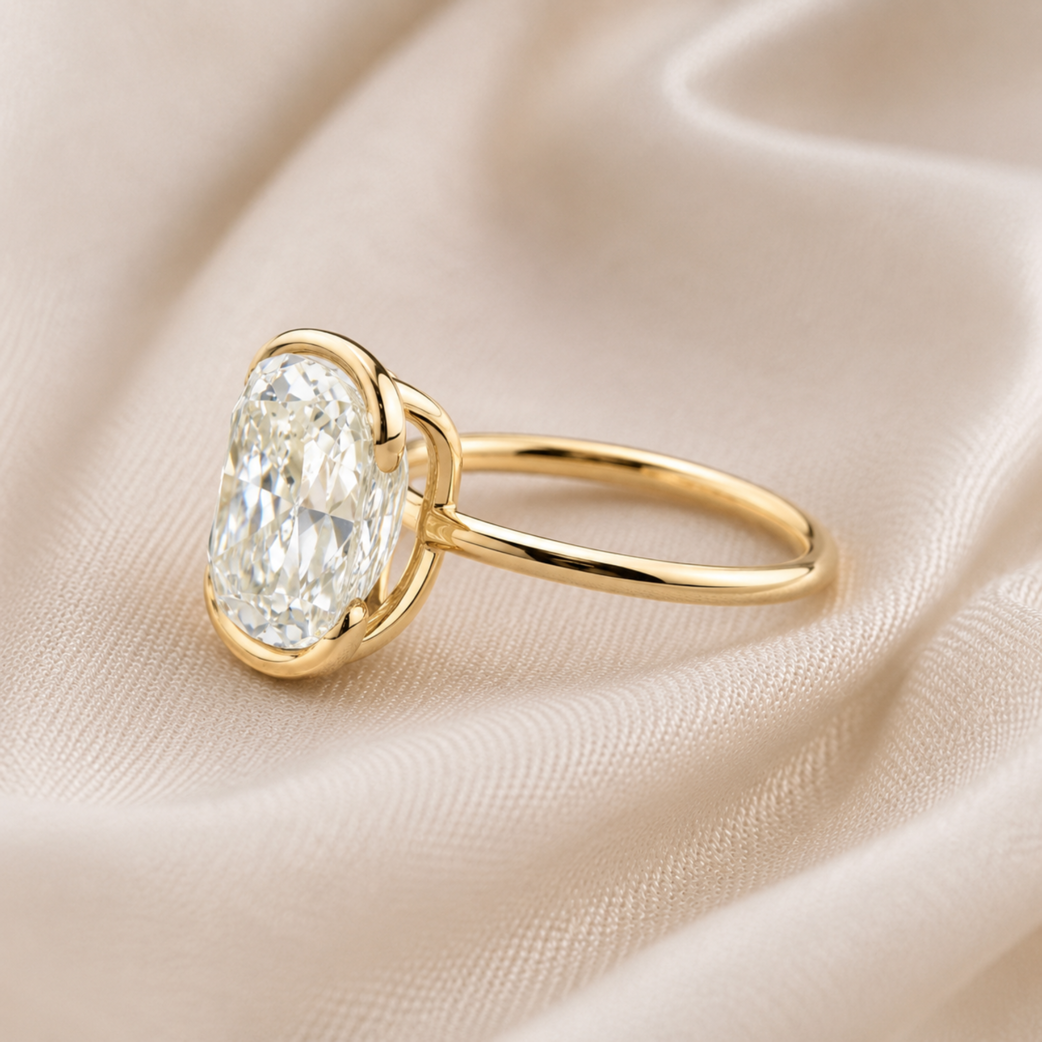 Large oval diamond engagement ring with minimalist yellow gold band