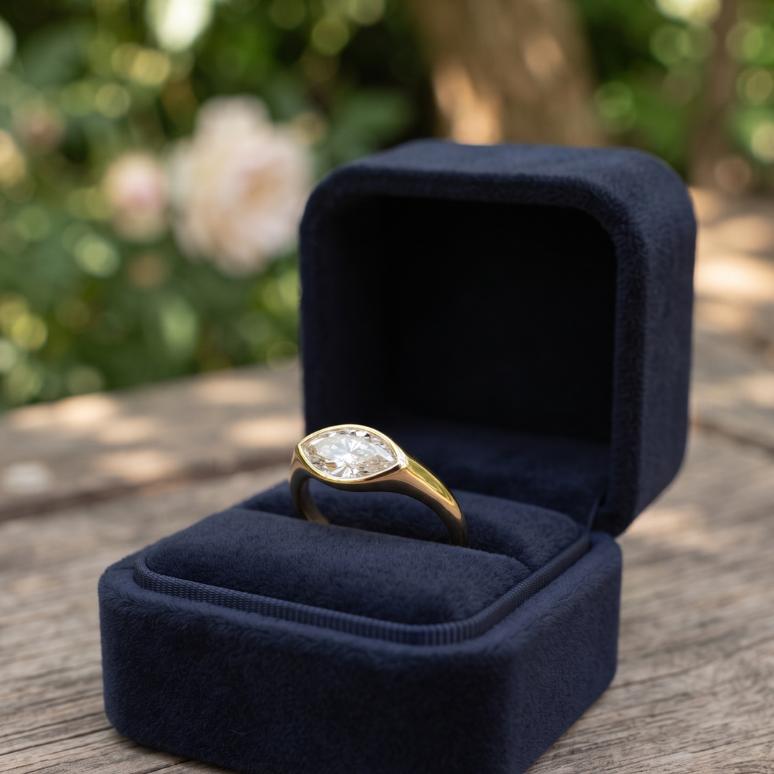 Kiashaa Jewellery 1.76 CT marquise bezel diamond ring in polished yellow gold.