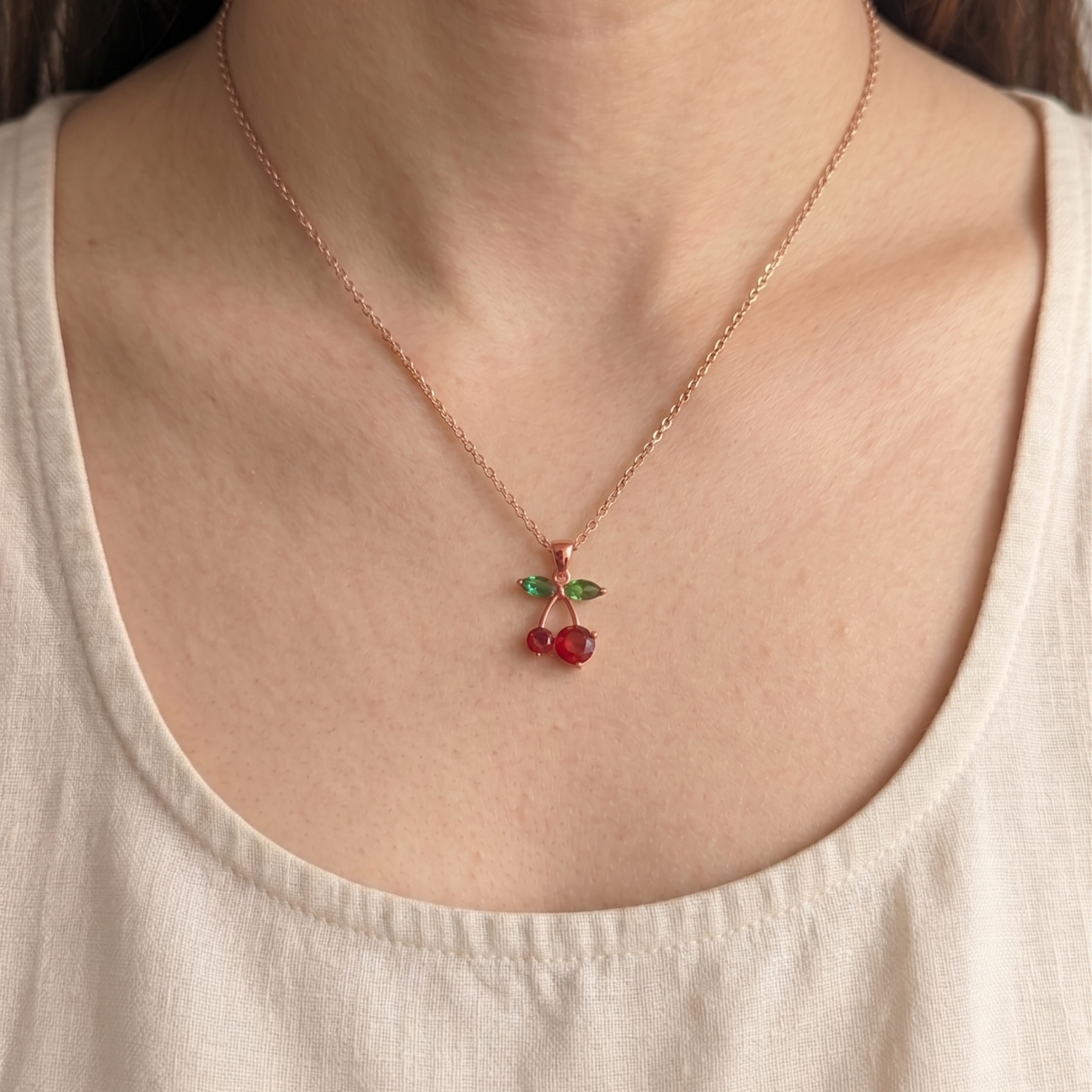 Handcrafted green diamond and red gemstone necklace by Kiashaa Jewellery in yellow gold.