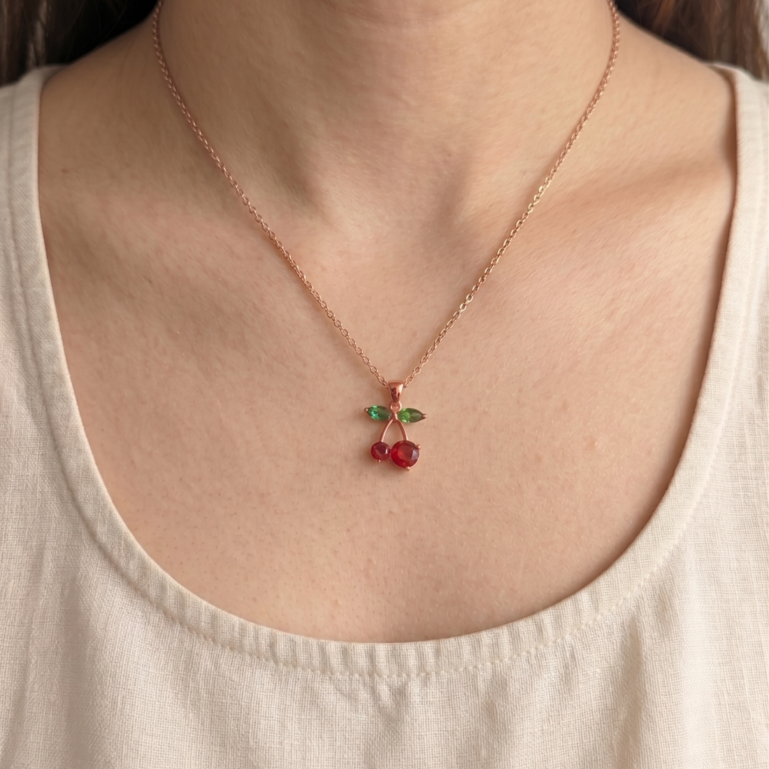 Handcrafted green diamond and red gemstone necklace by Kiashaa Jewellery in yellow gold.