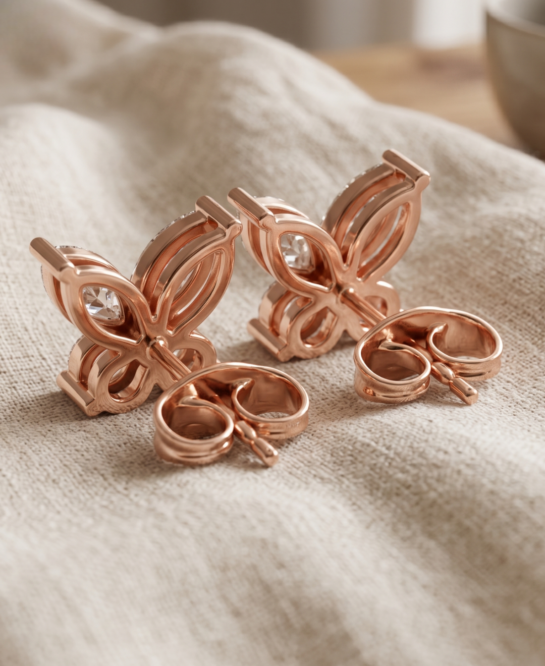 Elegant butterfly diamond earrings crafted with marquise-cut and round brilliant lab-grown diamonds.