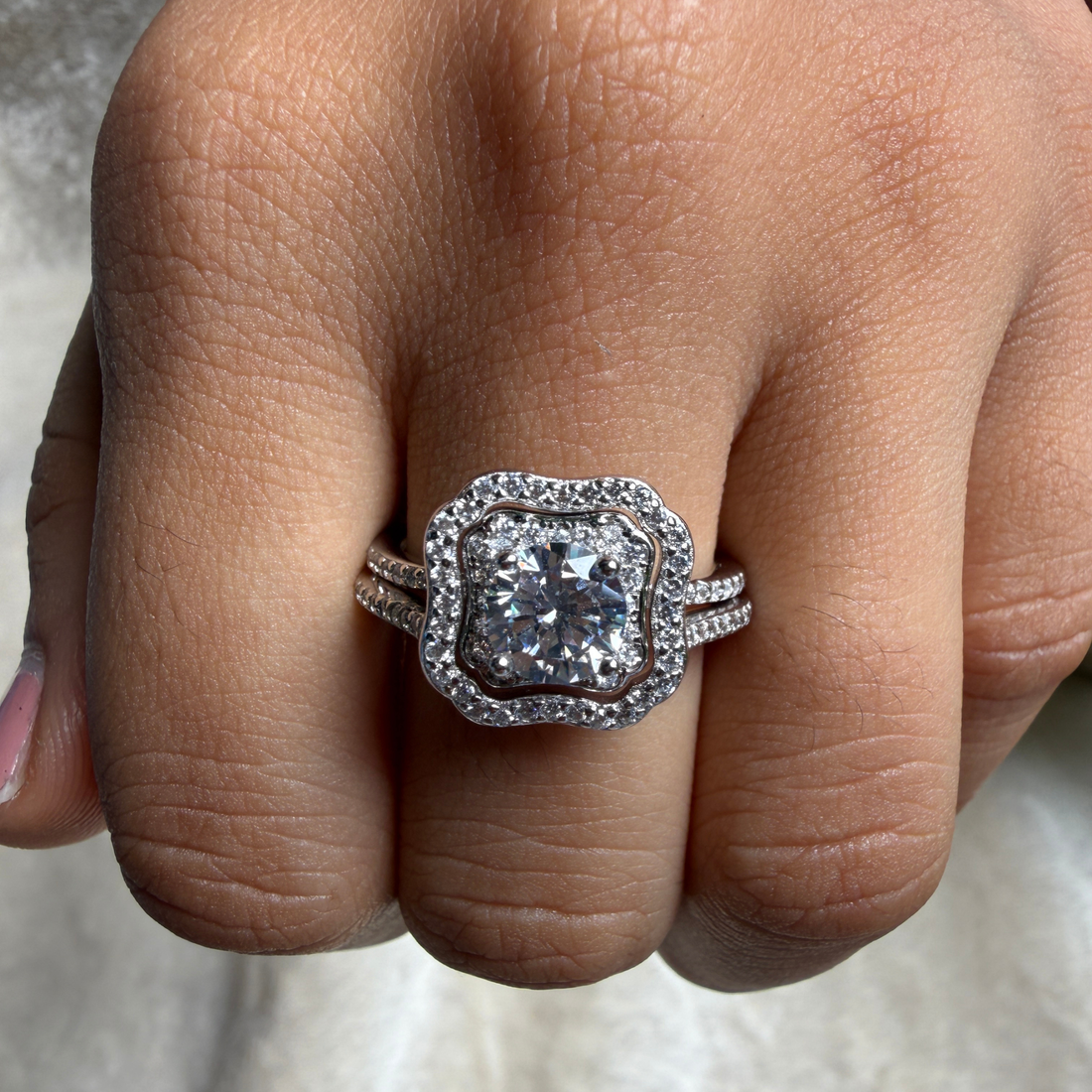 Round halo lab-grown diamond engagement ring in white gold by Kiashaa Jewellery.