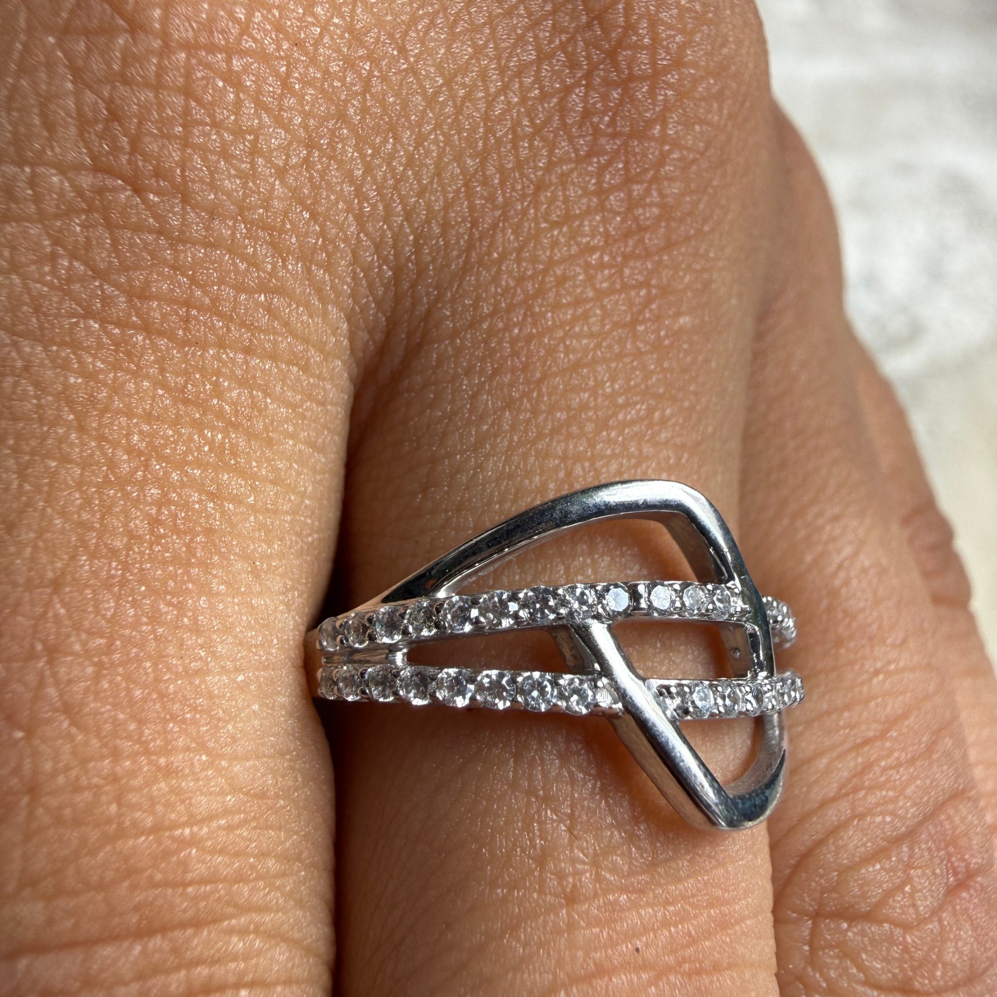 Contemporary open-frame diamond ring handcrafted in 9K, 14K and 18K gold.