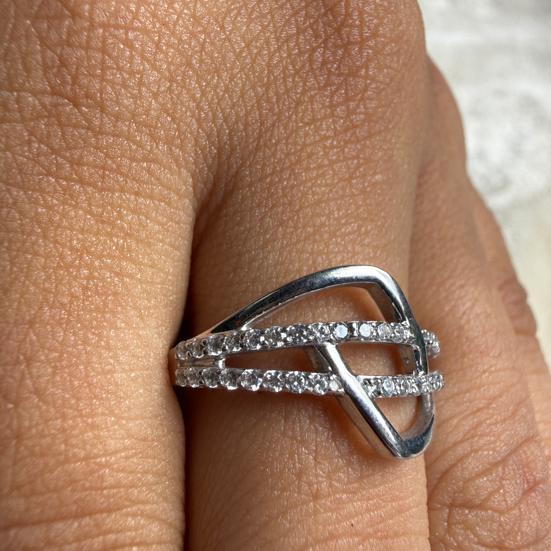 Contemporary open-frame diamond ring handcrafted in 9K, 14K and 18K gold.