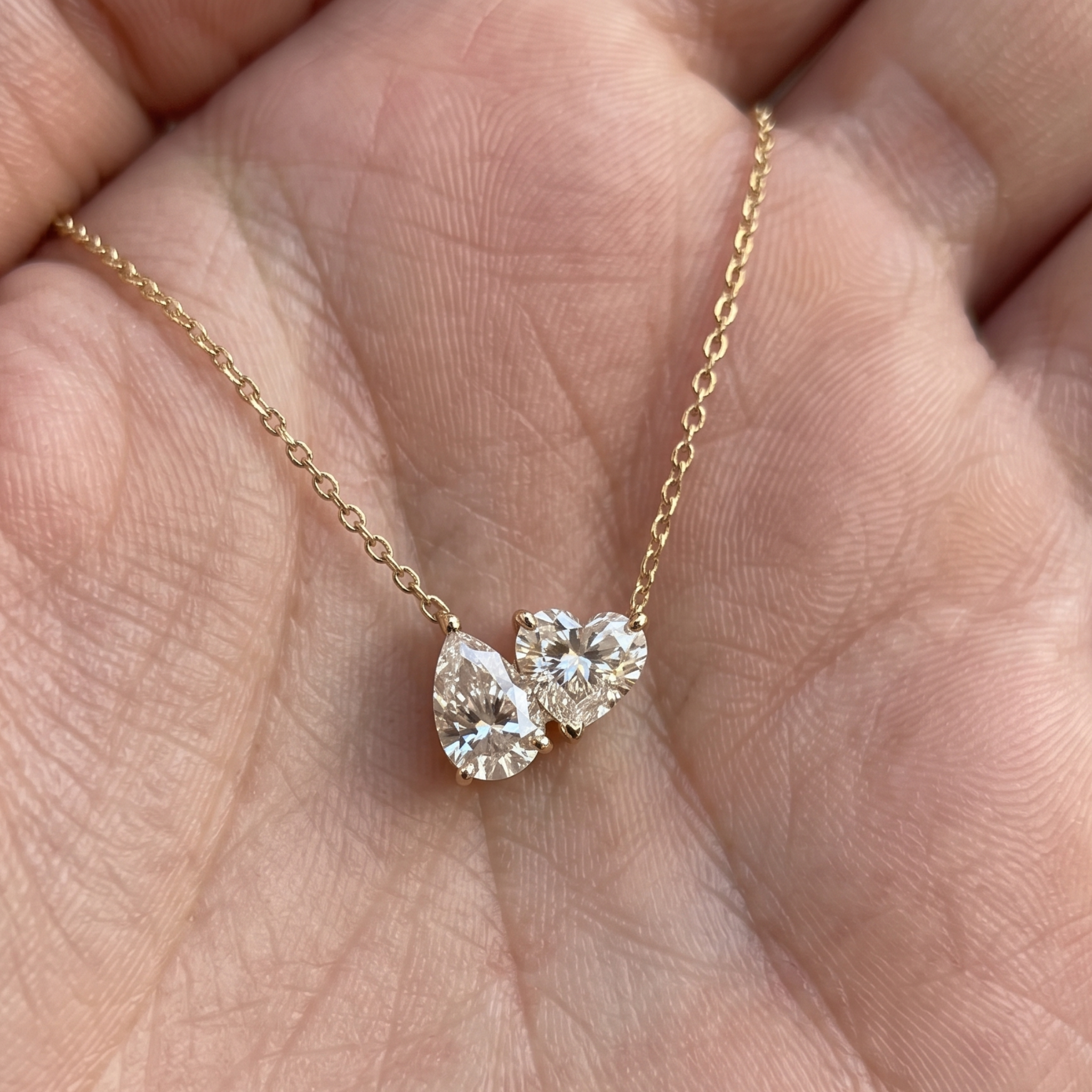 Kiashaa Jewellery 1.45 CTW pear and heart diamond necklace in polished yellow gold.