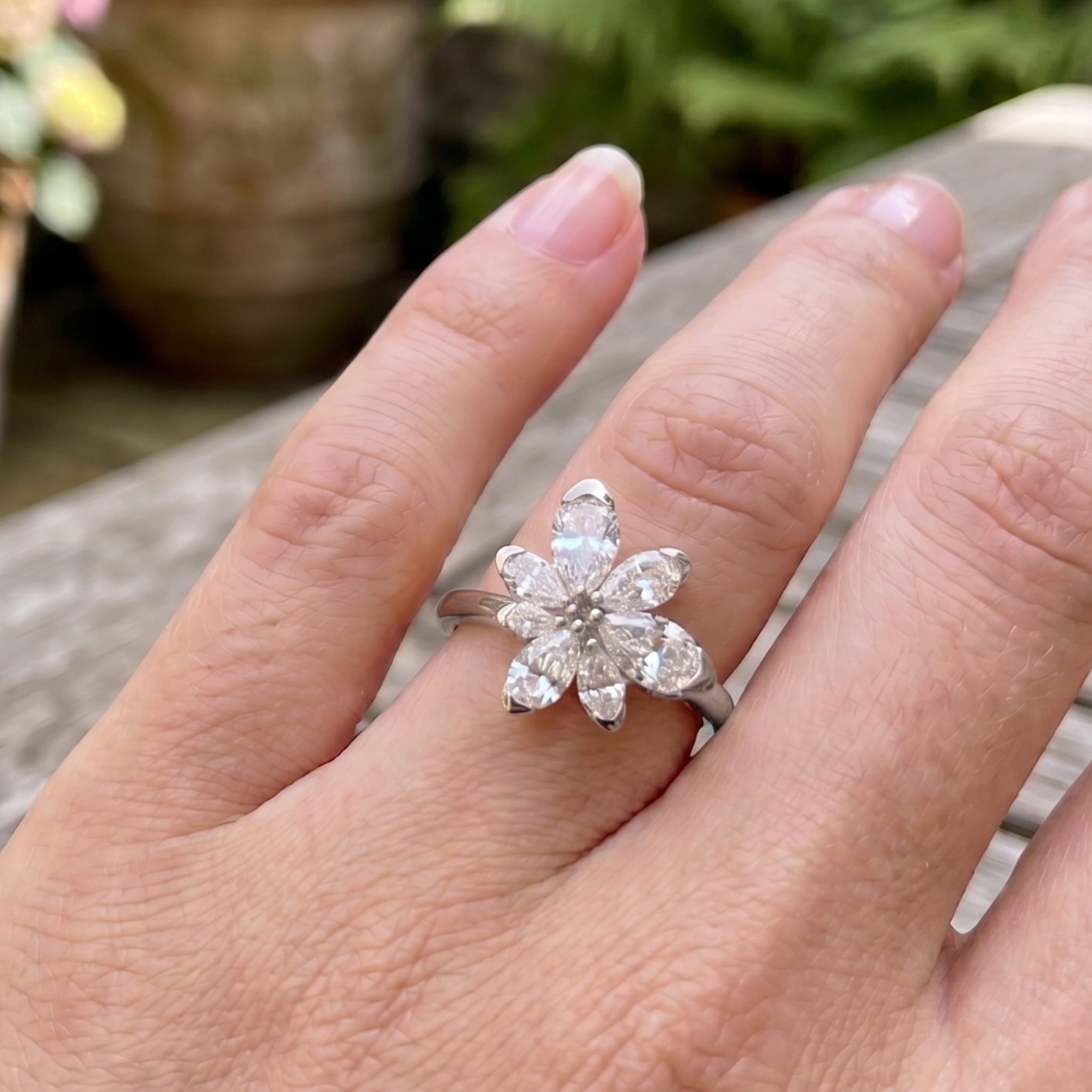 Élan Bloom 2 CTW pear diamond flower ring by Kiashaa Jewellery featuring approximately seven pear-shaped diamond petals.